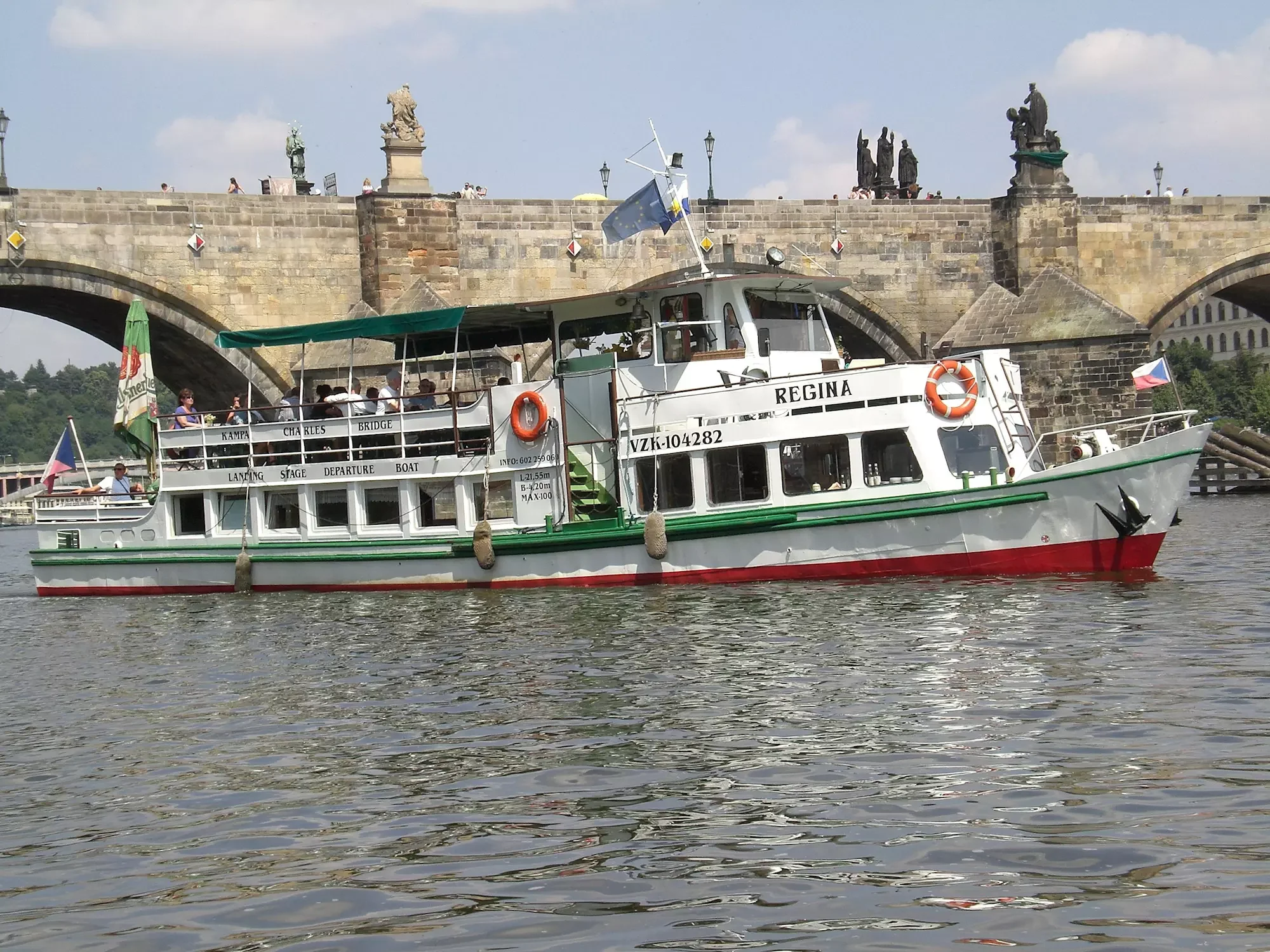 Private sightseeing boat tour under Charles Bridge in Prague