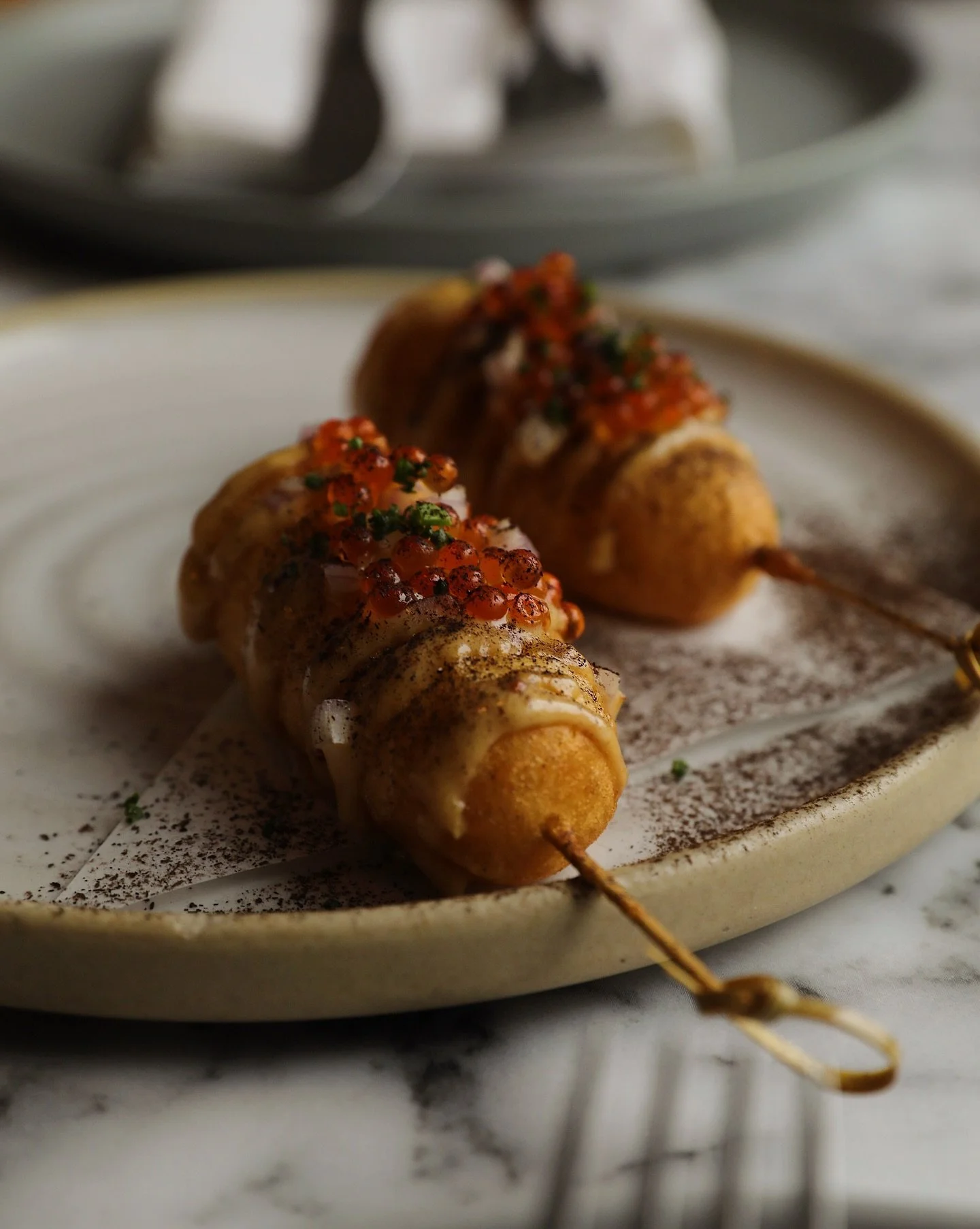 Close up of one of our happy hour favorites, the Mortadella Corn Dog is our take on what a corn dog should be: savory, filling, and juicy.

Available for happy hour during the first and last hour of every day.