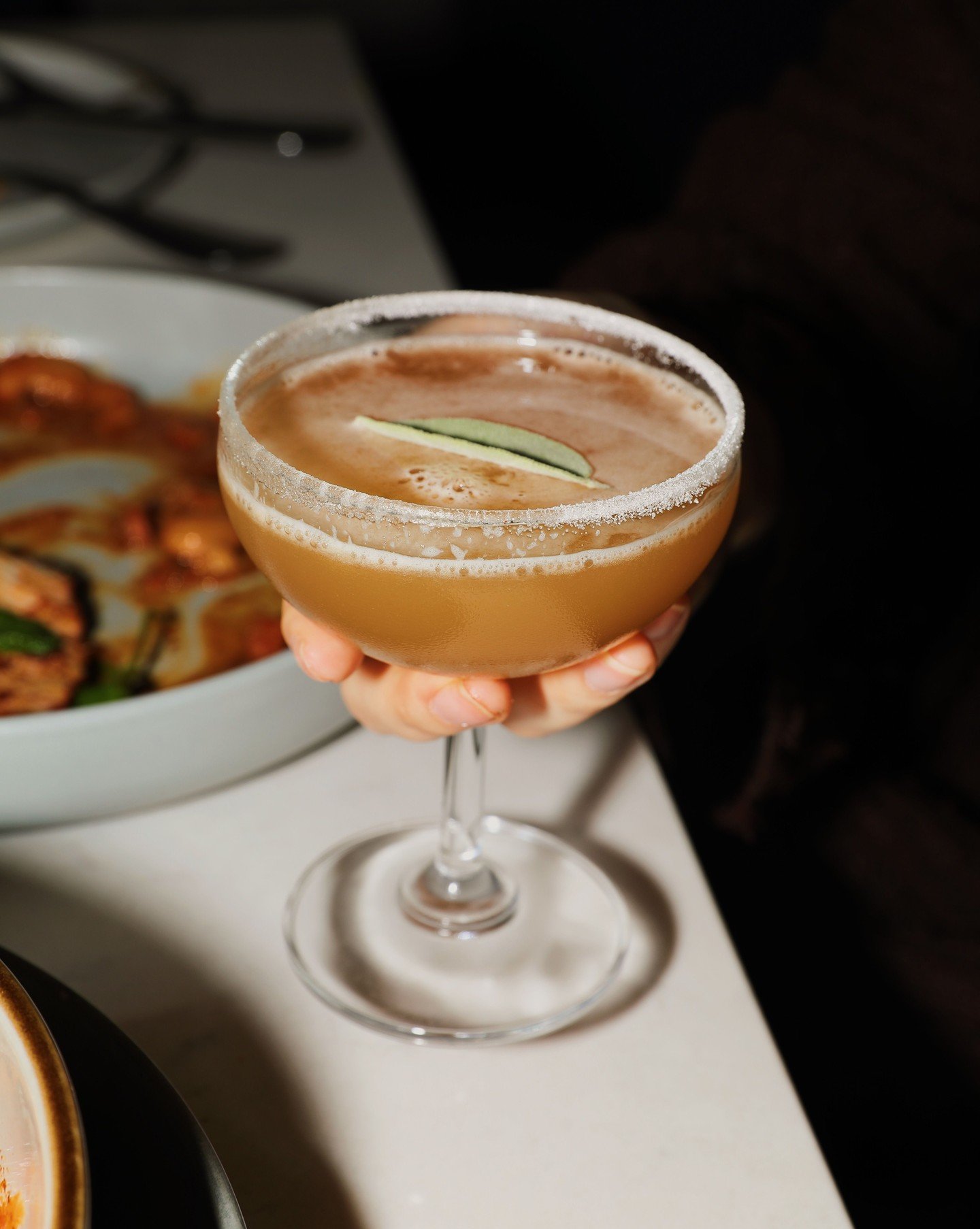 The Floor Is Lavender &mdash; our lemon drop riff with lavender-infused vodka, limoncello, sage syrup, and fresh lemon juice.

Your spot at the bar is ready. Book at our link-in-bio. 🔗