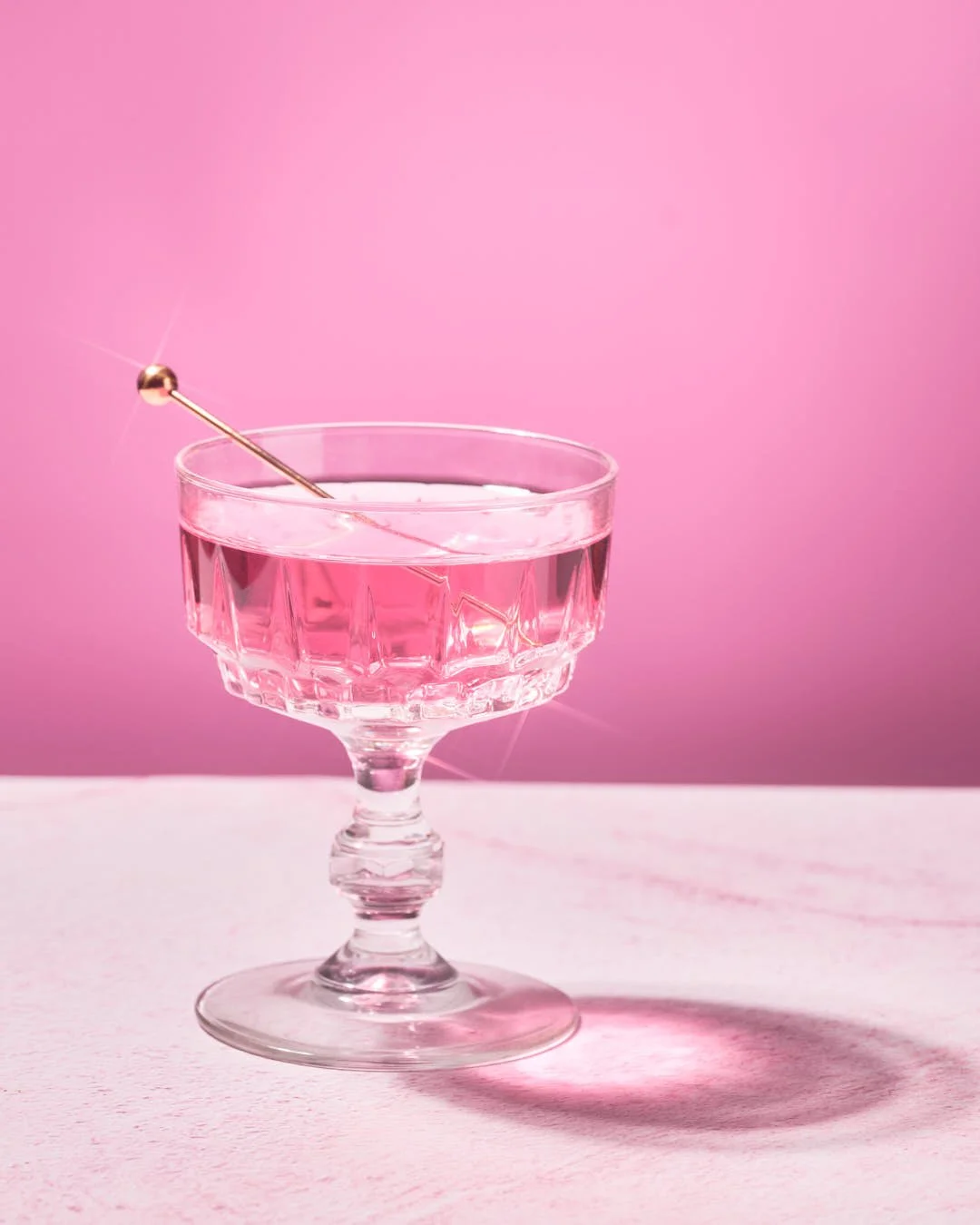 Raspberry drink on pink background captured by Jan - The Resilient Creative - Food Photographer in Far North Queensland Australia