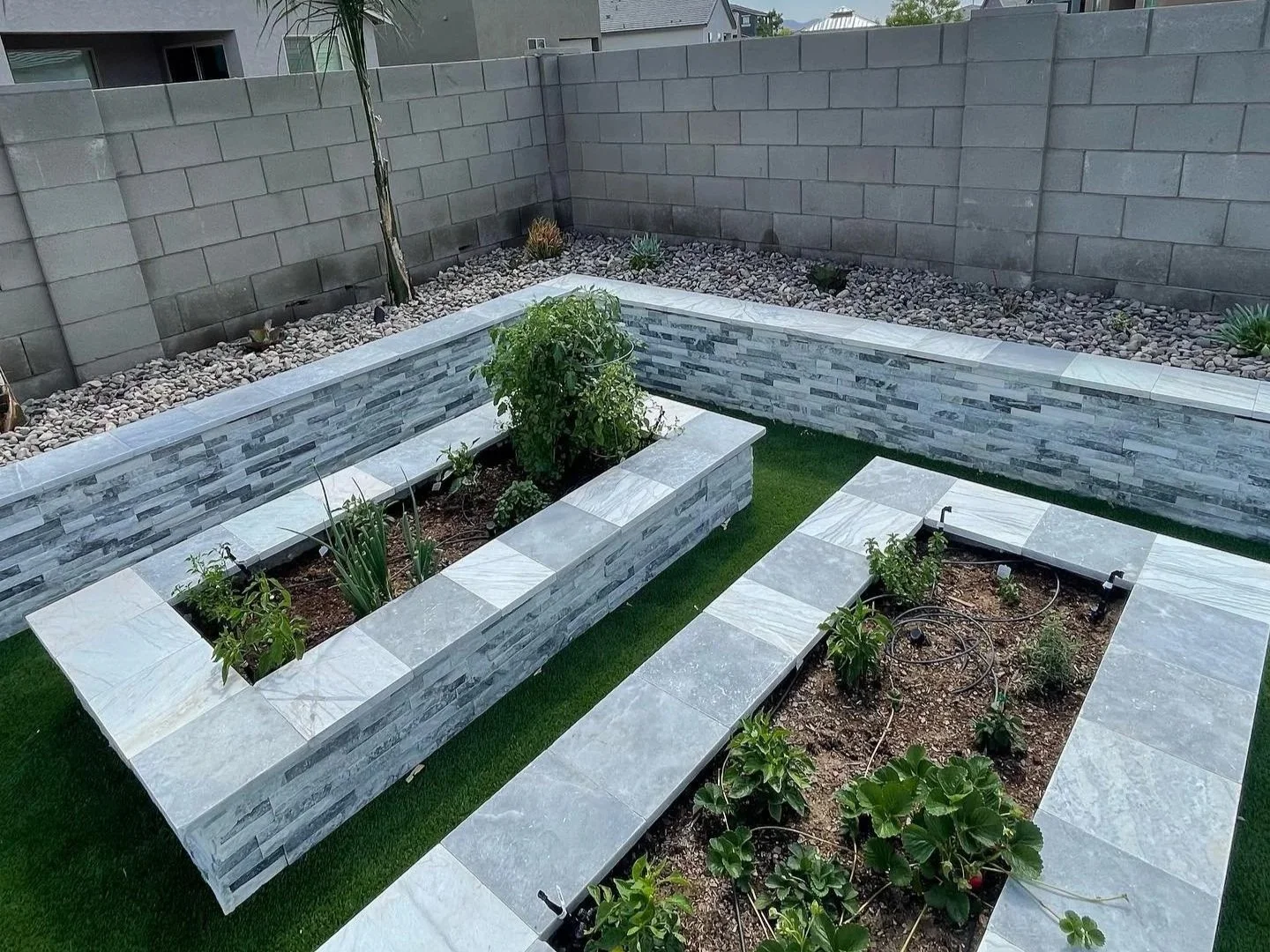 Garden Bed with Travertine Border Installation by Garcia's Dreamscapes in Phoenix, Arizona