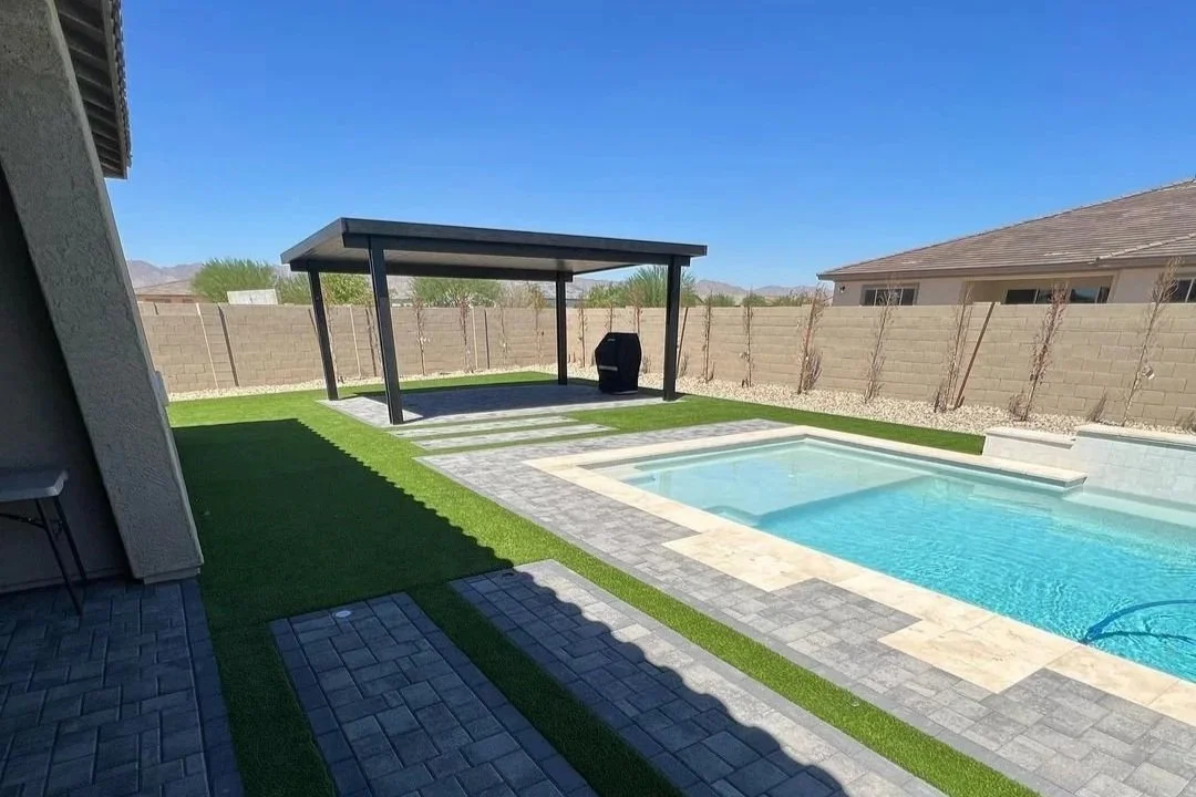 Pergola installed at this residential home in Phoenix, Arizona by Garcia's Dreamscapes along with turf and pavers