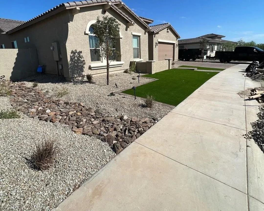 Residential front yard gravel, tree planting and turf installation services by Garcia's Dreamscapes near Phoenix, Arizona