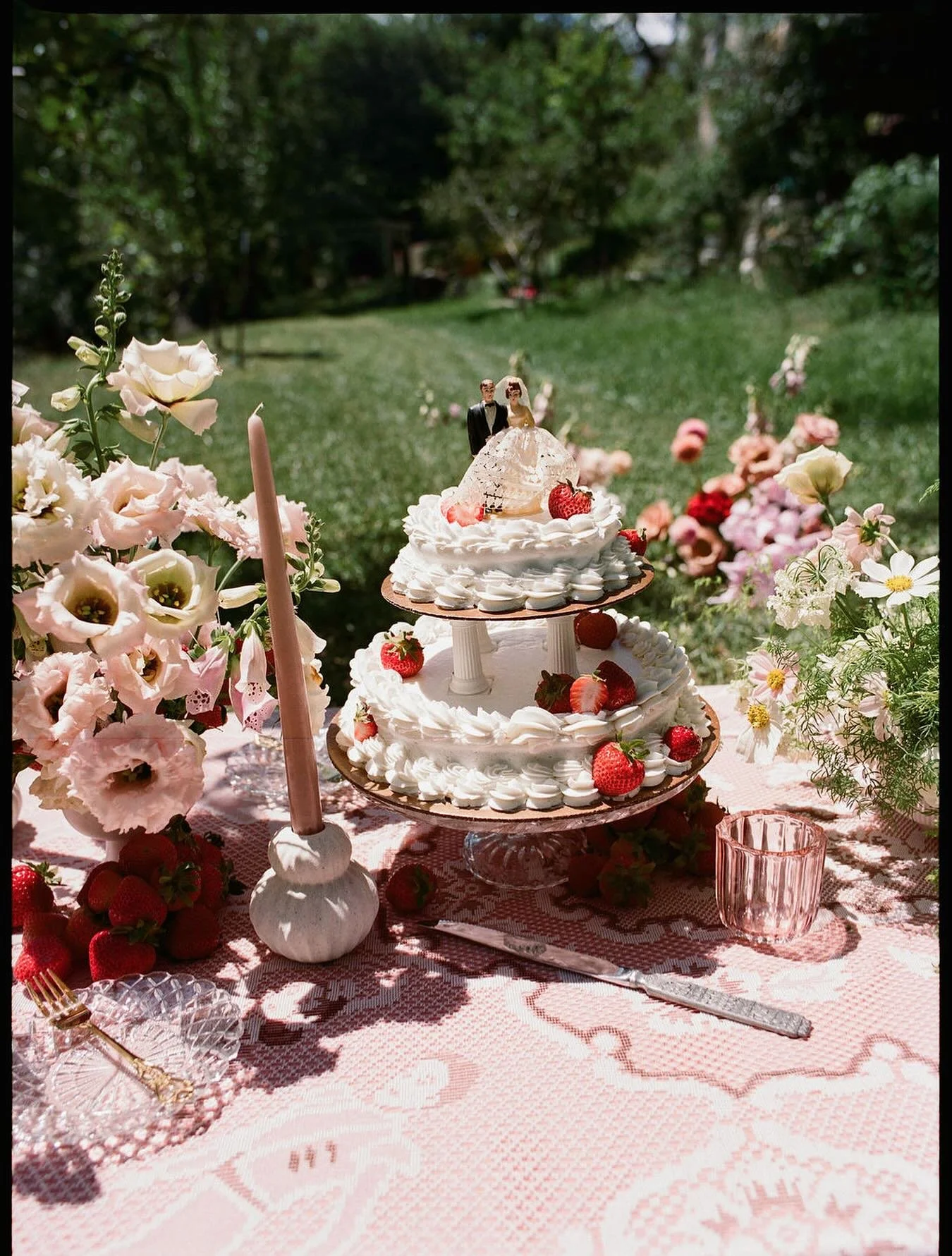 Our newest taper holders + votives showing off at this summer picnik set up!