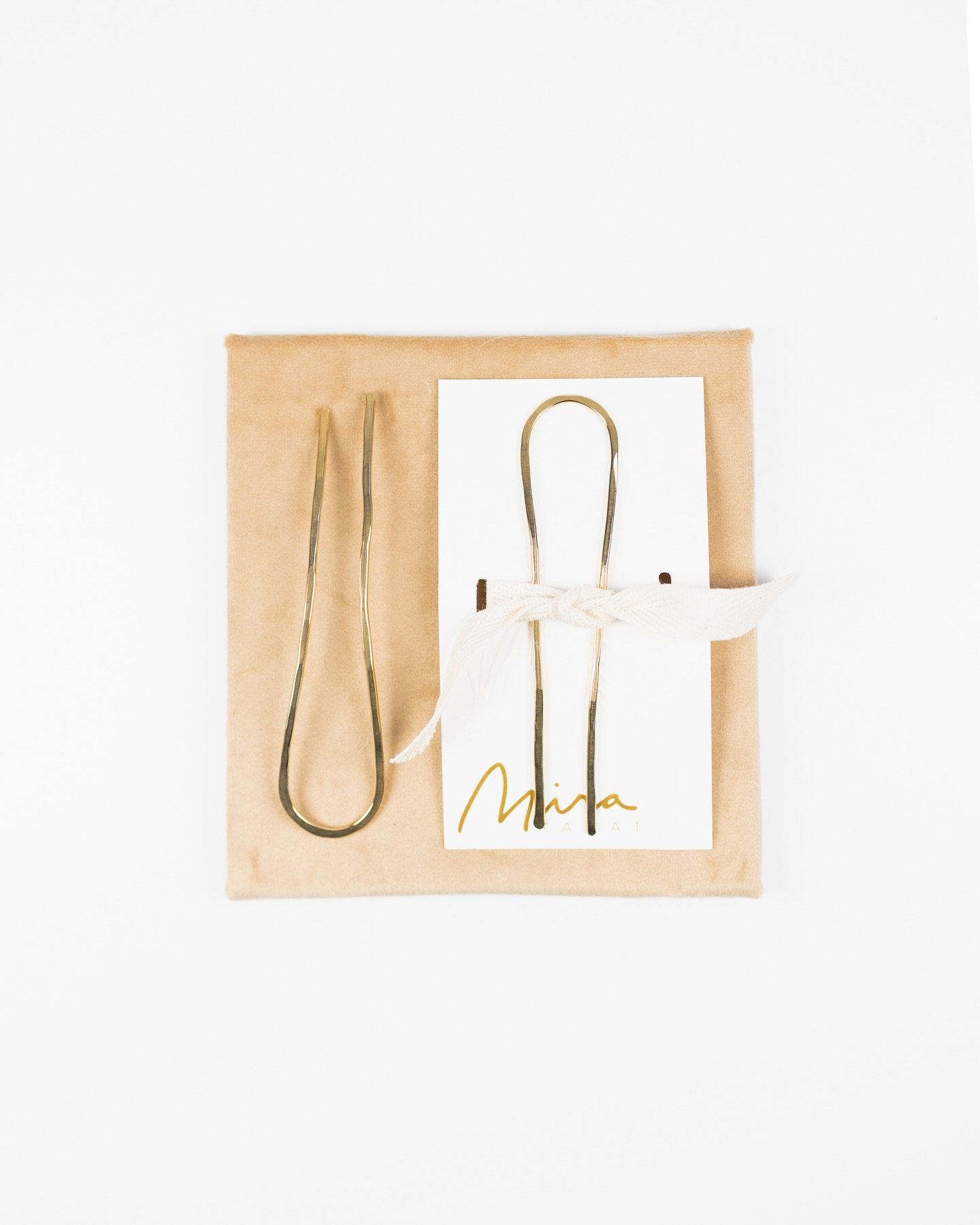 Meet the elevated alternative to the claw clip: our hammered brass French Pin! 

Designed for effortless, all-day hold &mdash; without the bulk or breakage. While claw clips can feel clunky (and tend to snap when you need them most), our hammered bra