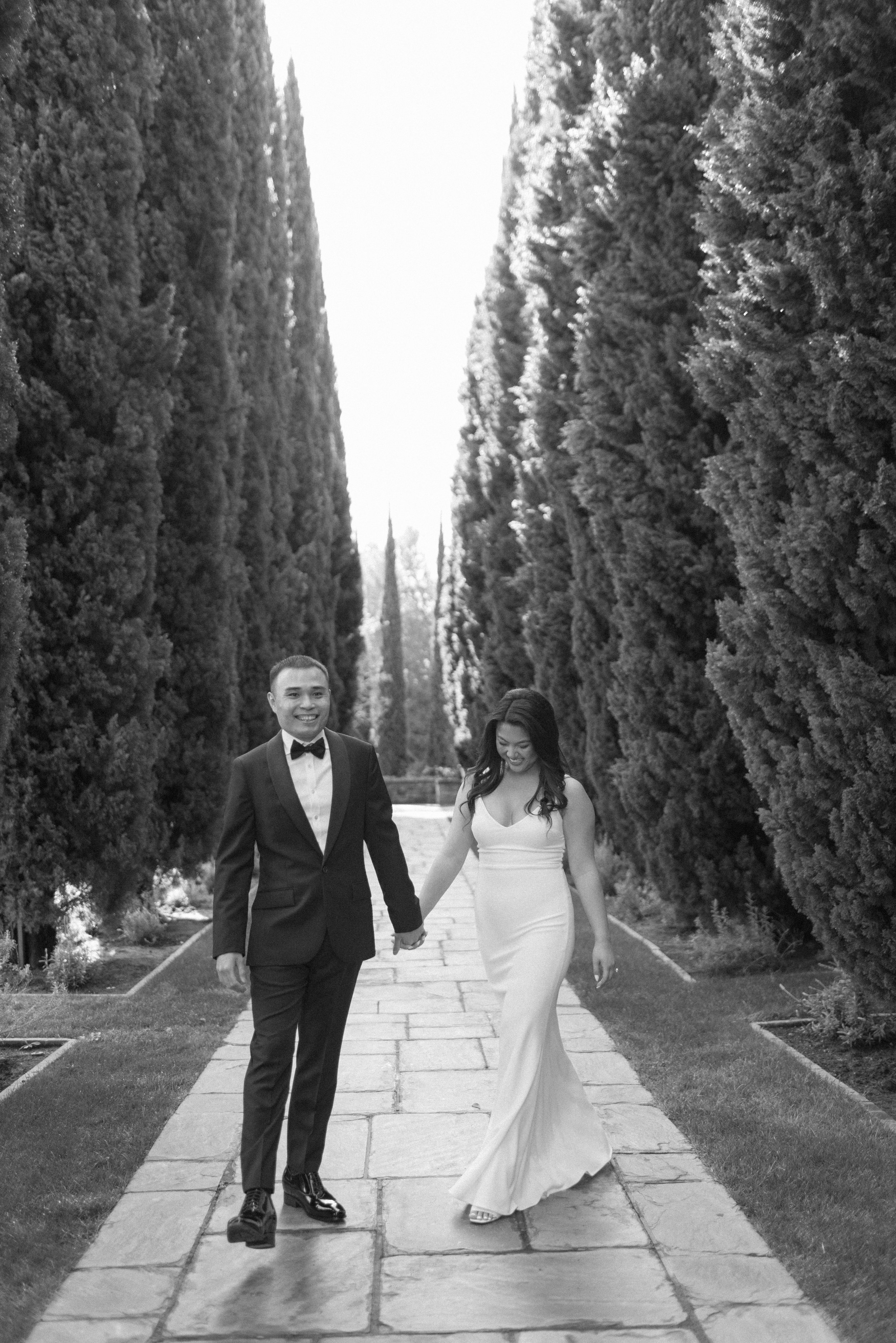 couple holding hands during engagement shoot in LA