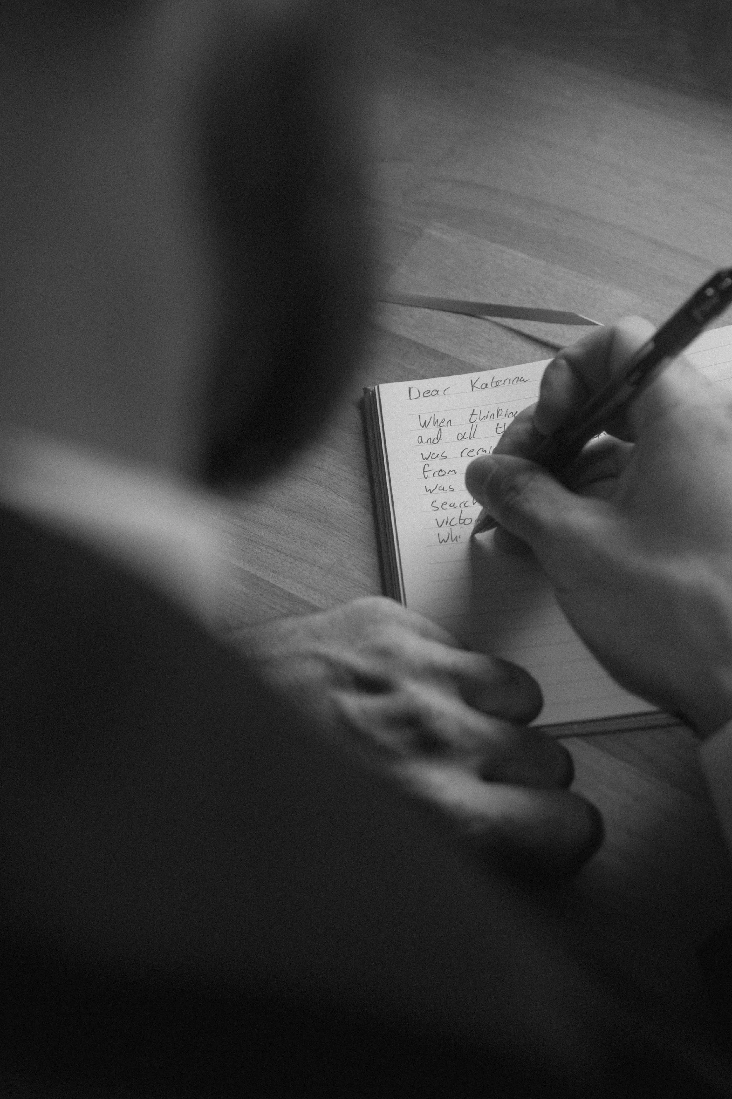 Groom writing vows