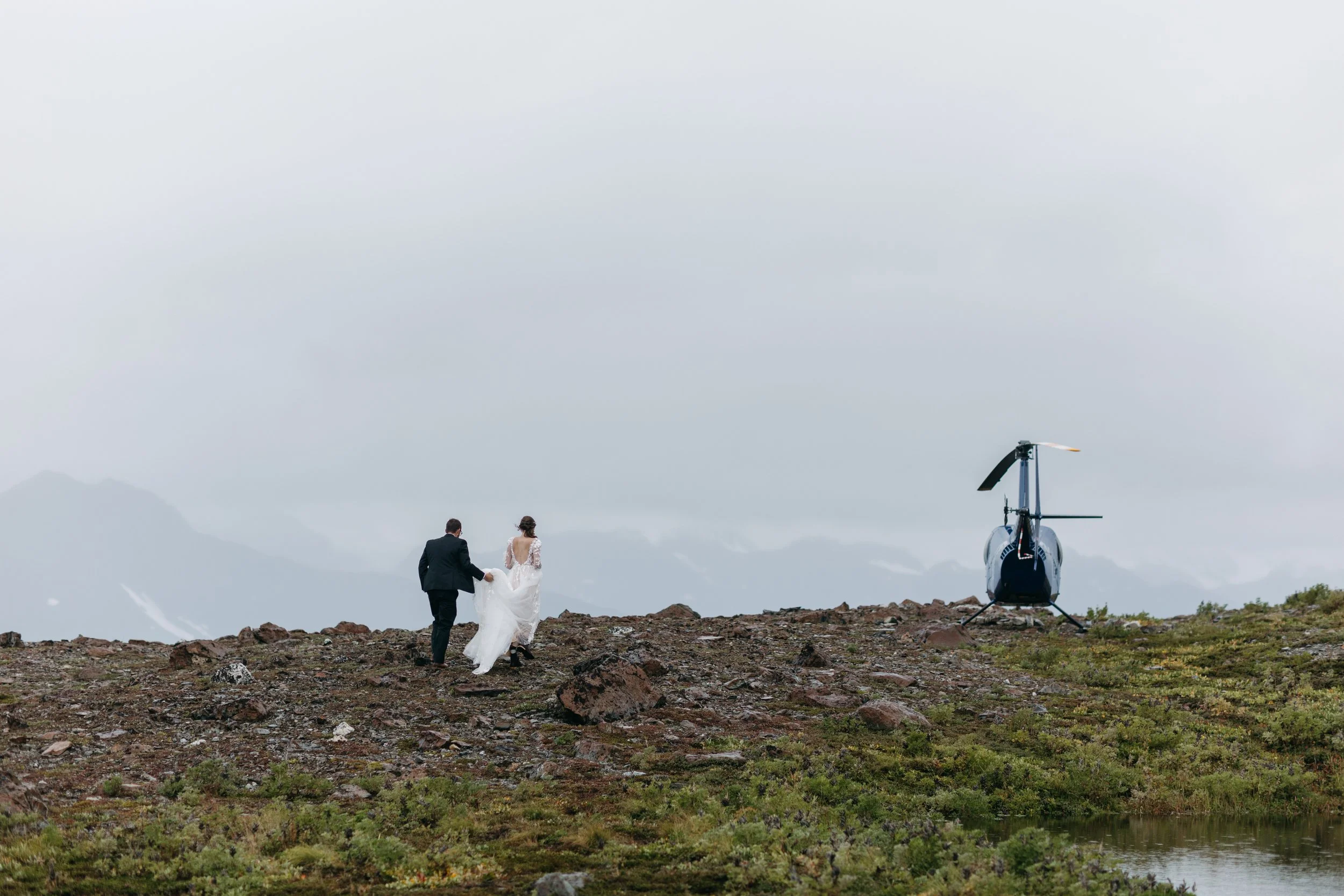 Adventurous Alaska helicopter elopement with dramatic mountain views