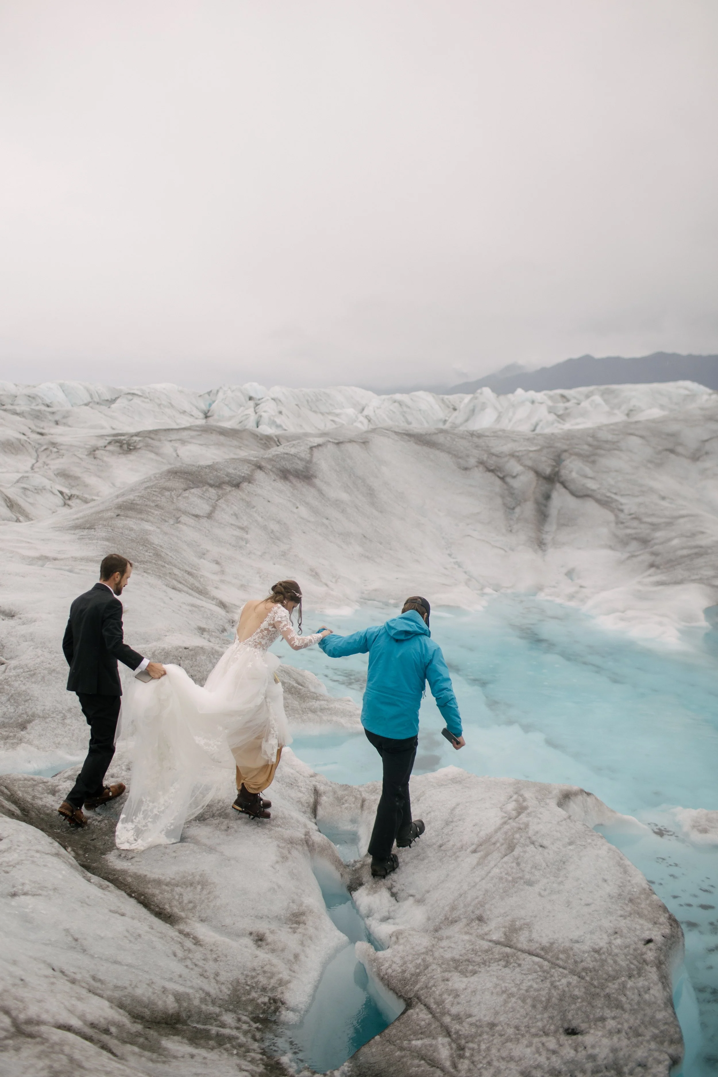 Couple hiking together during adventure elopement