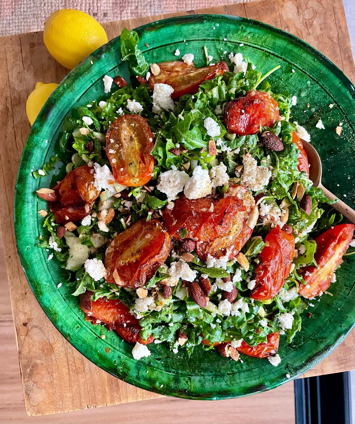 Silverbeet salad with feta, crushed almonds and roast tomatoes. Lots of garlic, mint and spring onion in the mix as well!
