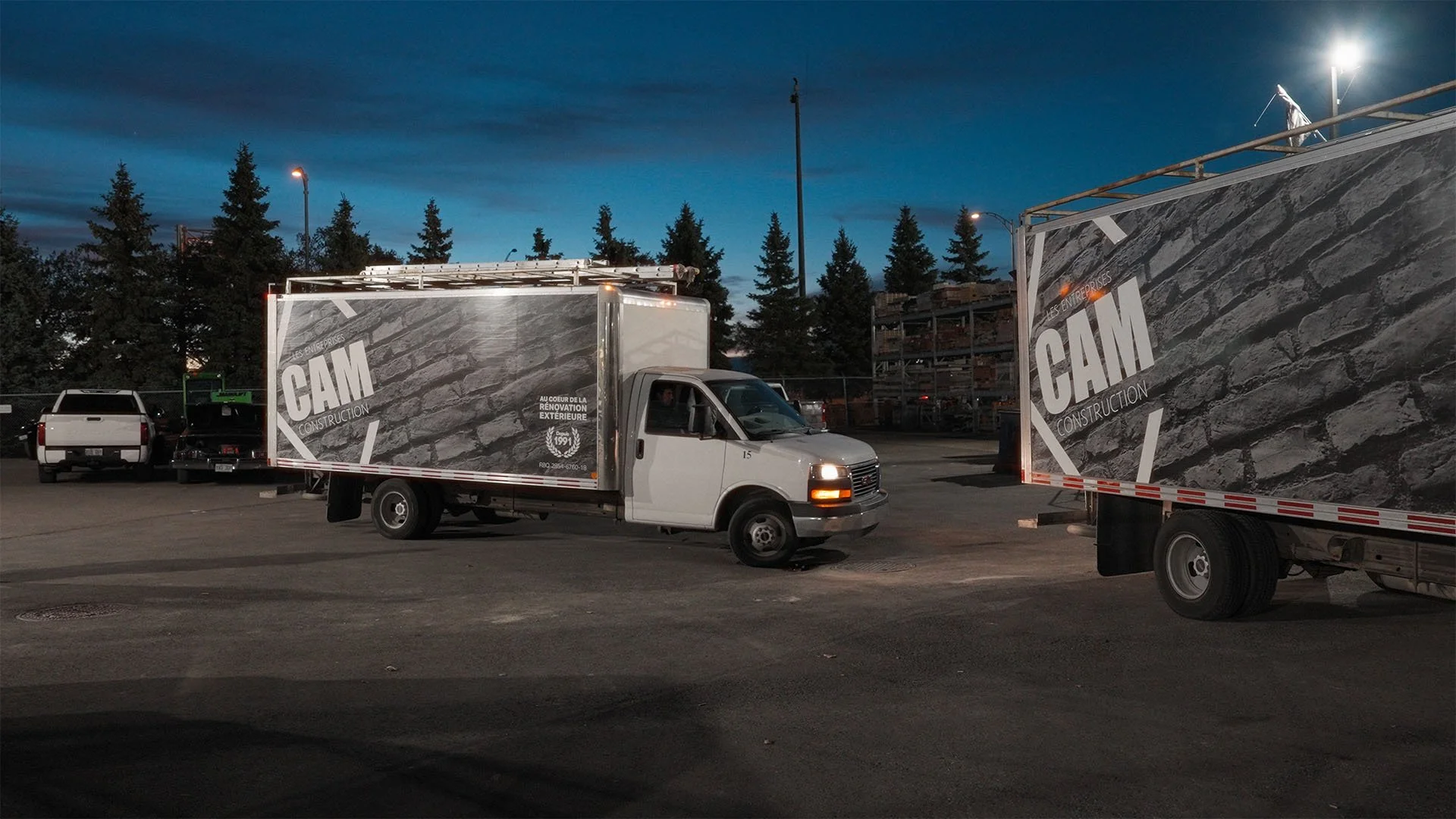 Construction company truck at morning blue hour