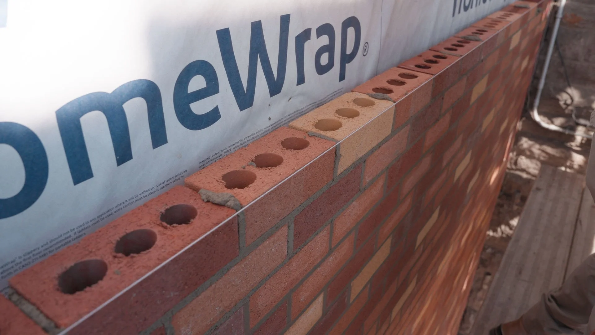 perfectly lined up brick wall construction