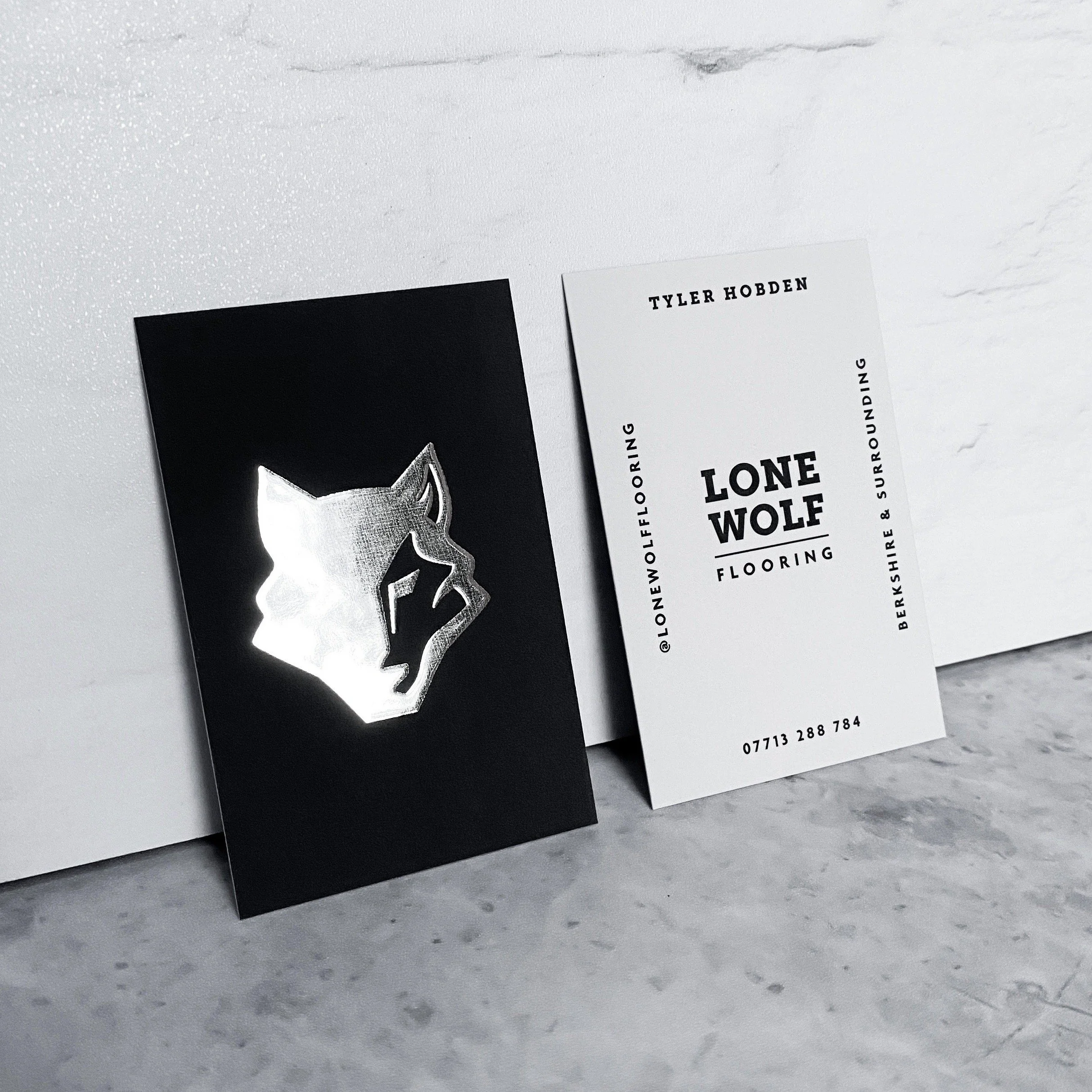 LONE WOLF FLOORING BUSINESS CARDS.JPG