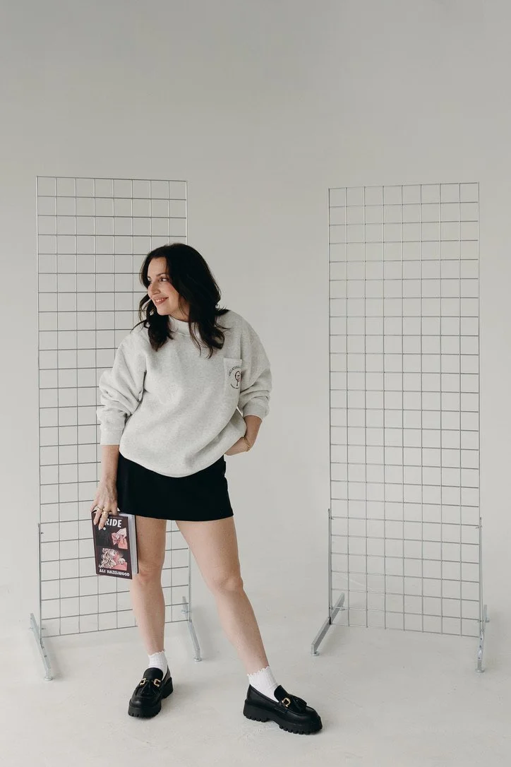 Grey marl mockneck sweatshirt with a chest pocket and “The Collateral Program” design inspired by Ali Hazelwood’s Bride.