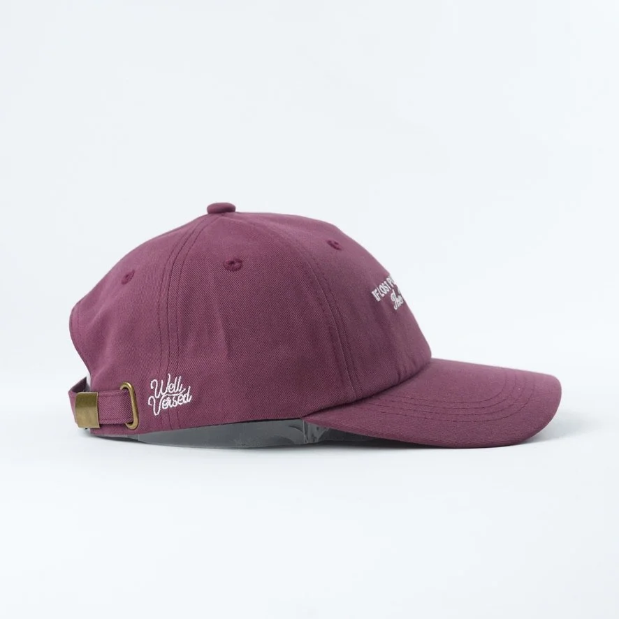 Purple baseball hat that reads If lost please return to the wingleader
