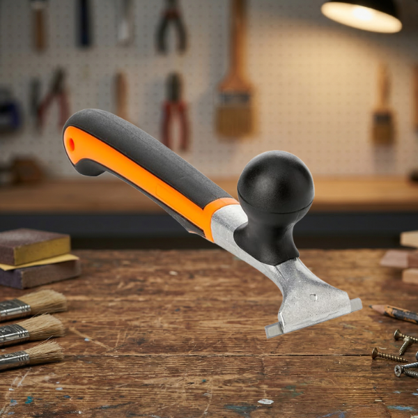 use a carbide scraper to remove finish before stripping or sanding