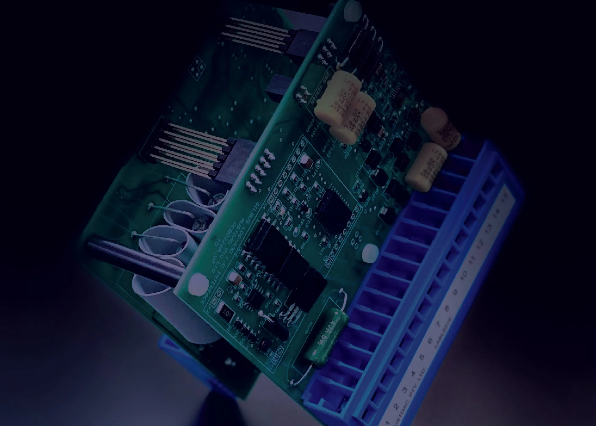 Custom PCB assembly with electronic components and terminal connectors for industrial electronics applications.