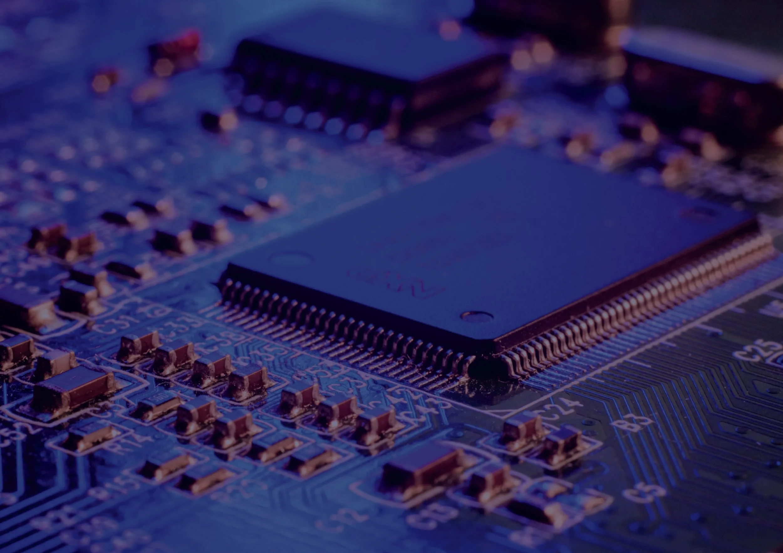 Close-up of a populated PCB highlighting precision surface-mount assembly and electronic components.
