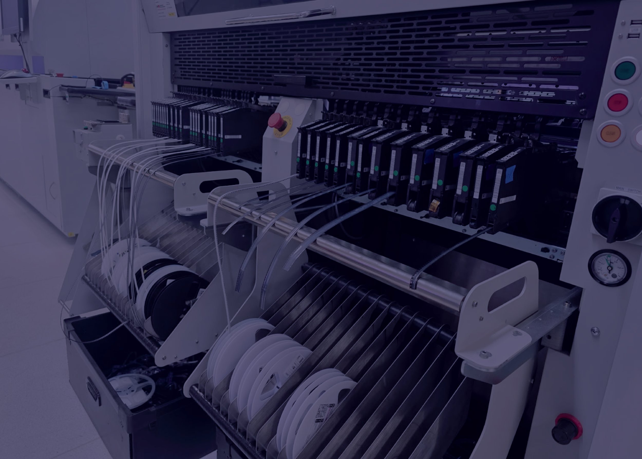 Advanced SMT pick-and-place machine assembling printed circuit boards in an Australian electronics manufacturing facility, supporting high-volume PCB assembly and electronic contract manufacturing services.