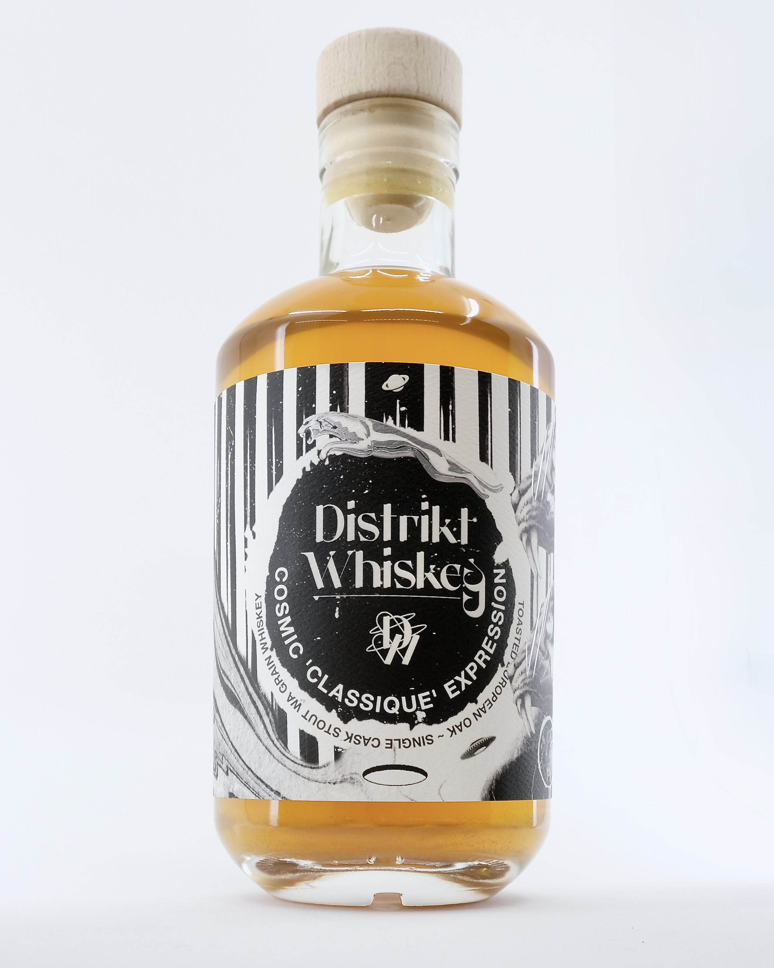 A high-build varnish adds dimensionality, drawing the eye to key design features, while Silver Foil accents bring a refined shimmer to the Jaguar illustration and logo—creating a striking interplay of light and luxury.