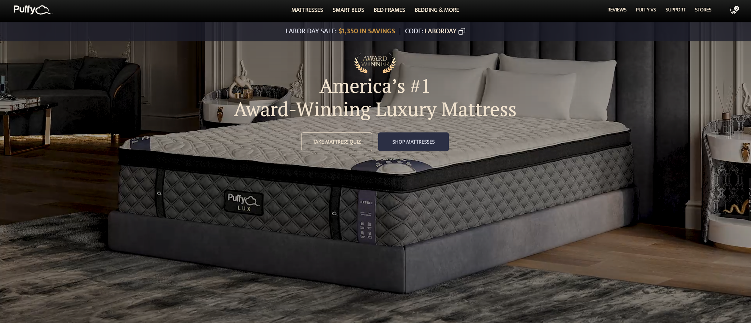Luxury mattress displayed in a sophisticated bedroom setting with a bed, pillows, side tables, and decorative items.