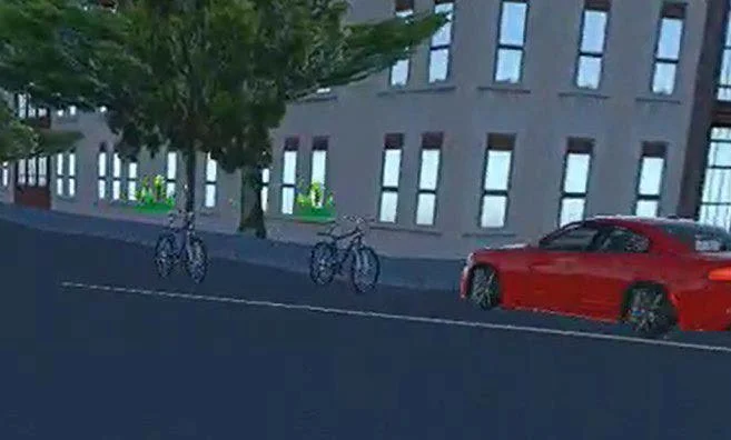 City street scene with a red car parked along the side of the road, two bicycles, and a building with large windows and trees in the background.