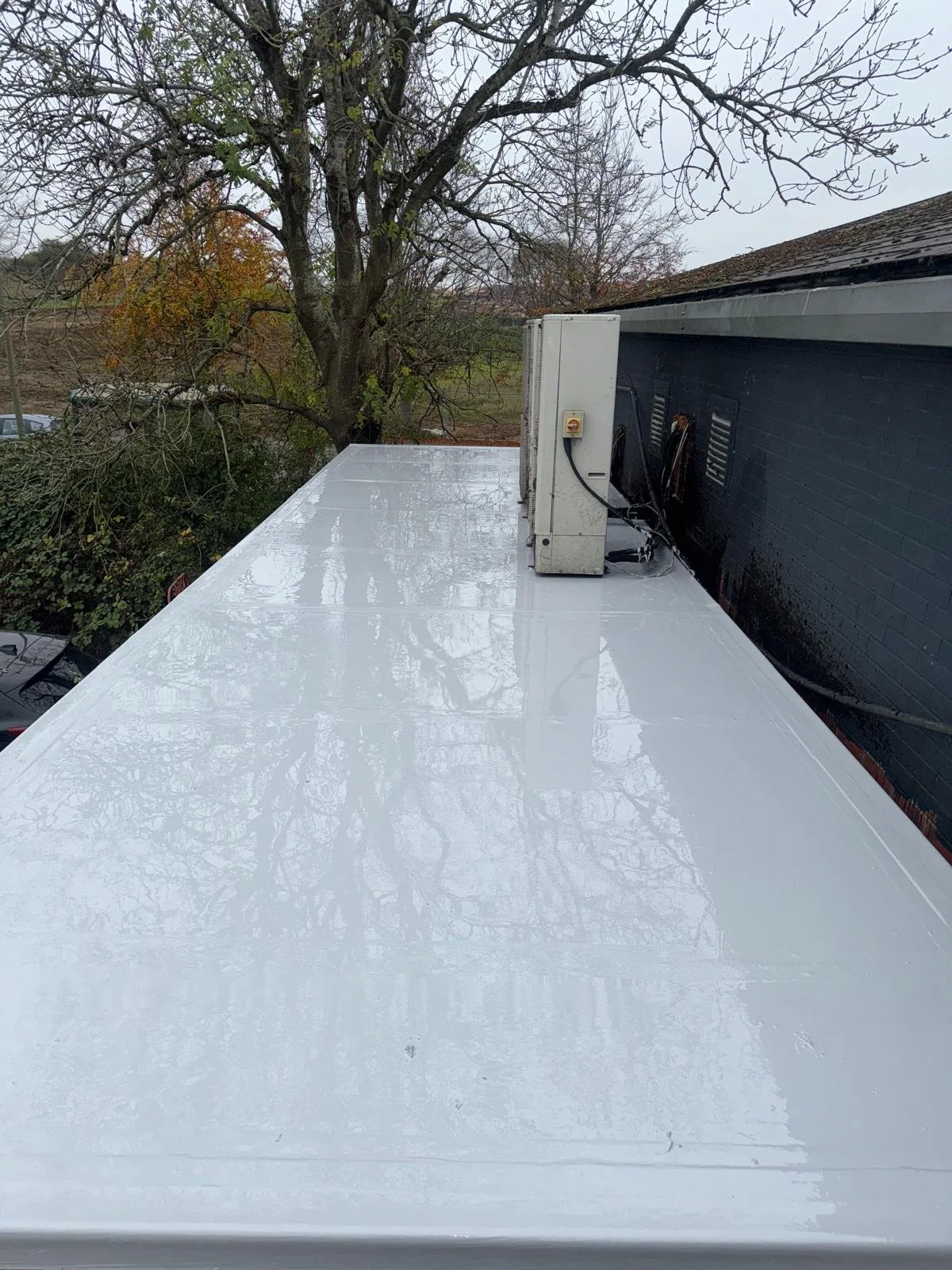 Shipping container roof overboarded and waterproofed with Lava 20 in Worsley, Greater Manchester.