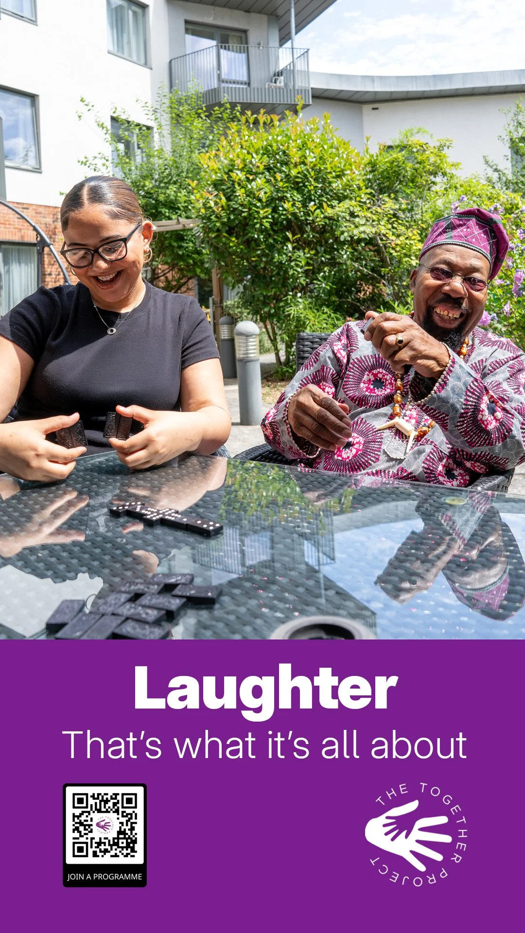 Campaign poster showing a joyful intergenerational moment with the word “Laughter”