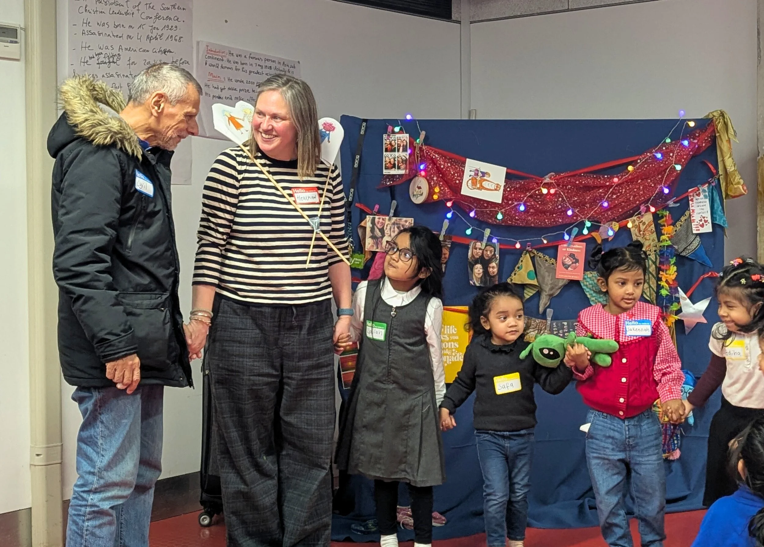 Children and older adults taking part in a You, Me, Us intergenerational storytelling session