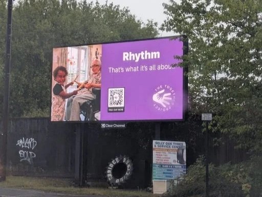 Billboard from The Together Project’s Clear Channel campaign featuring the message “Rhythm. That’s what it’s all about.”