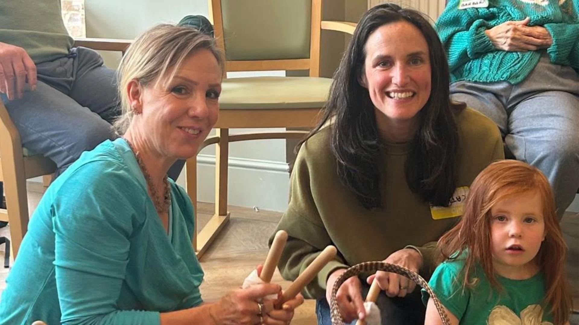 A cheerful Songs & Smiles moment at the end of a session