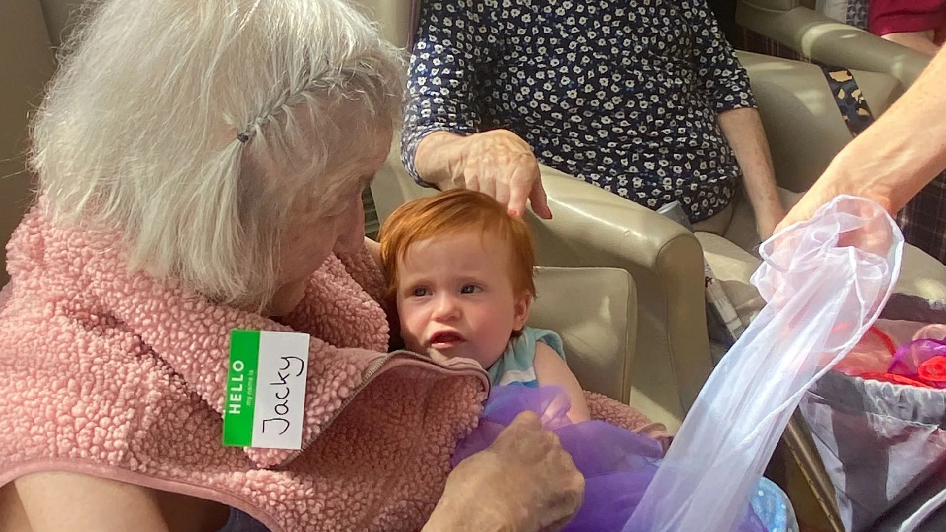 A gentle Songs & Smiles moment shared across generations