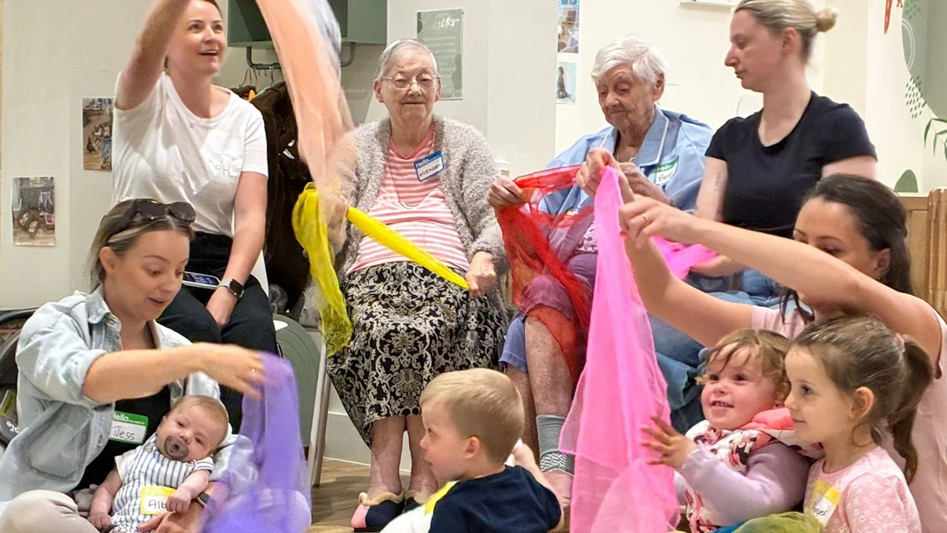 Families and care home residents enjoying a Songs & Smiles session at Jenni’s House
