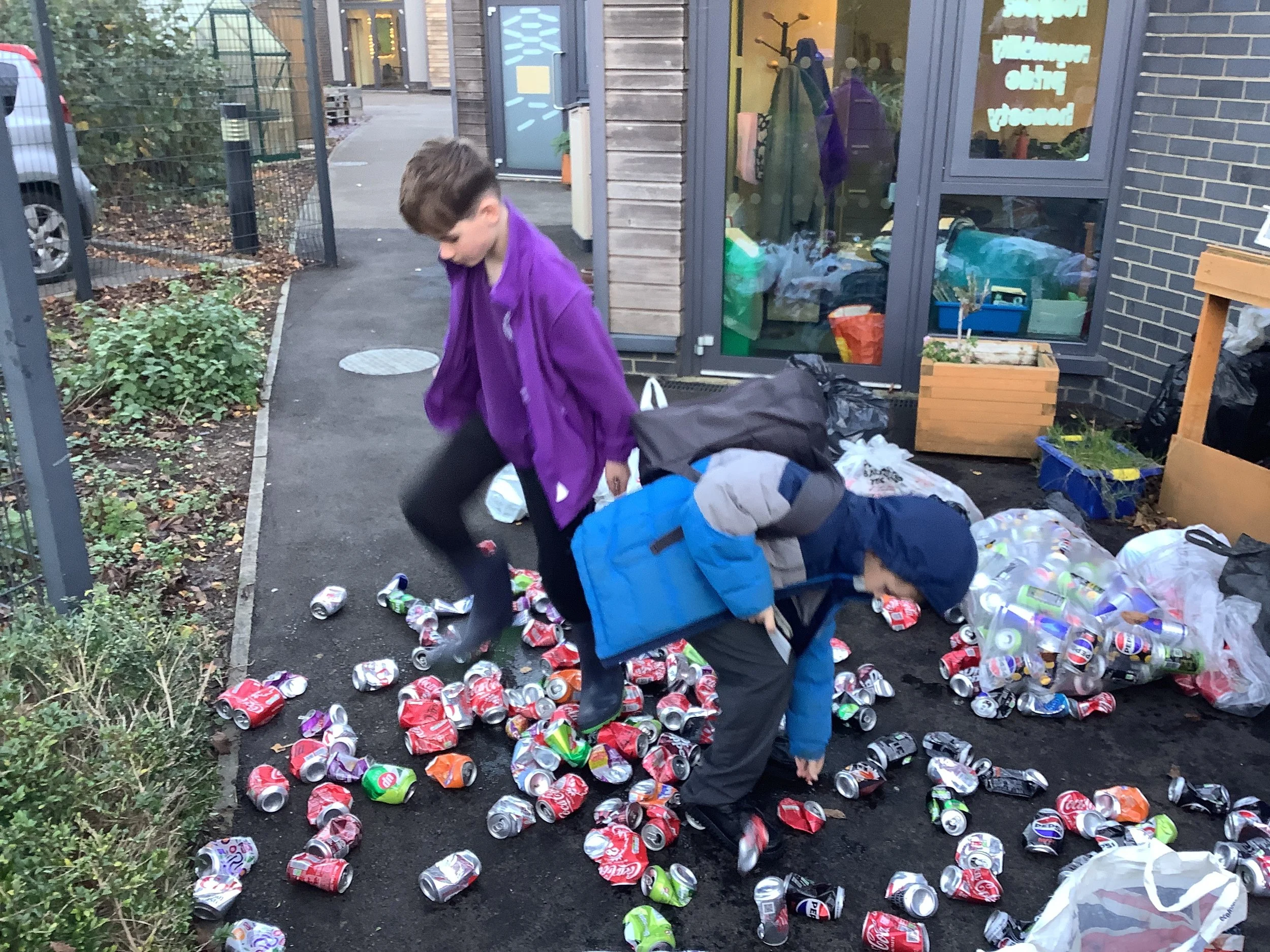 Crushing Cans.JPG
