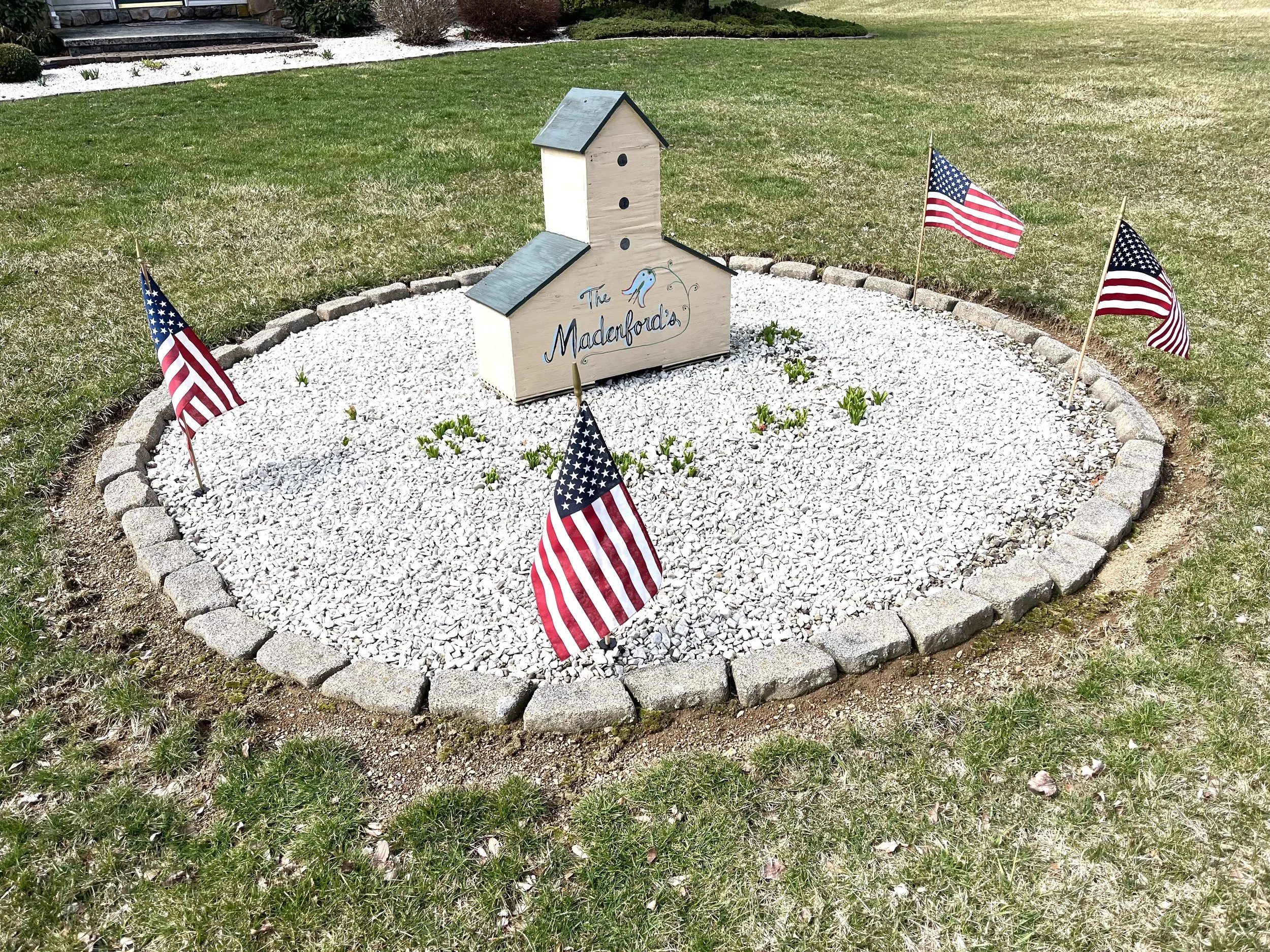 Small Flag Holders in Garden.JPEG