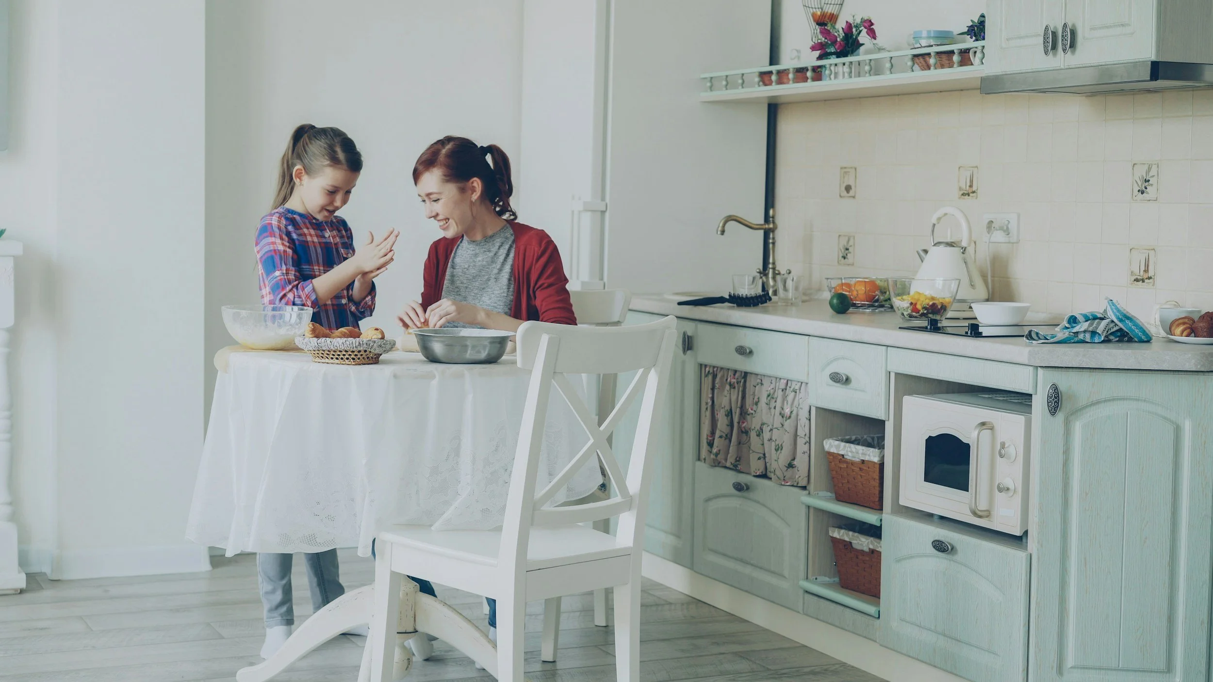 Mom and daughter happily exploring food together