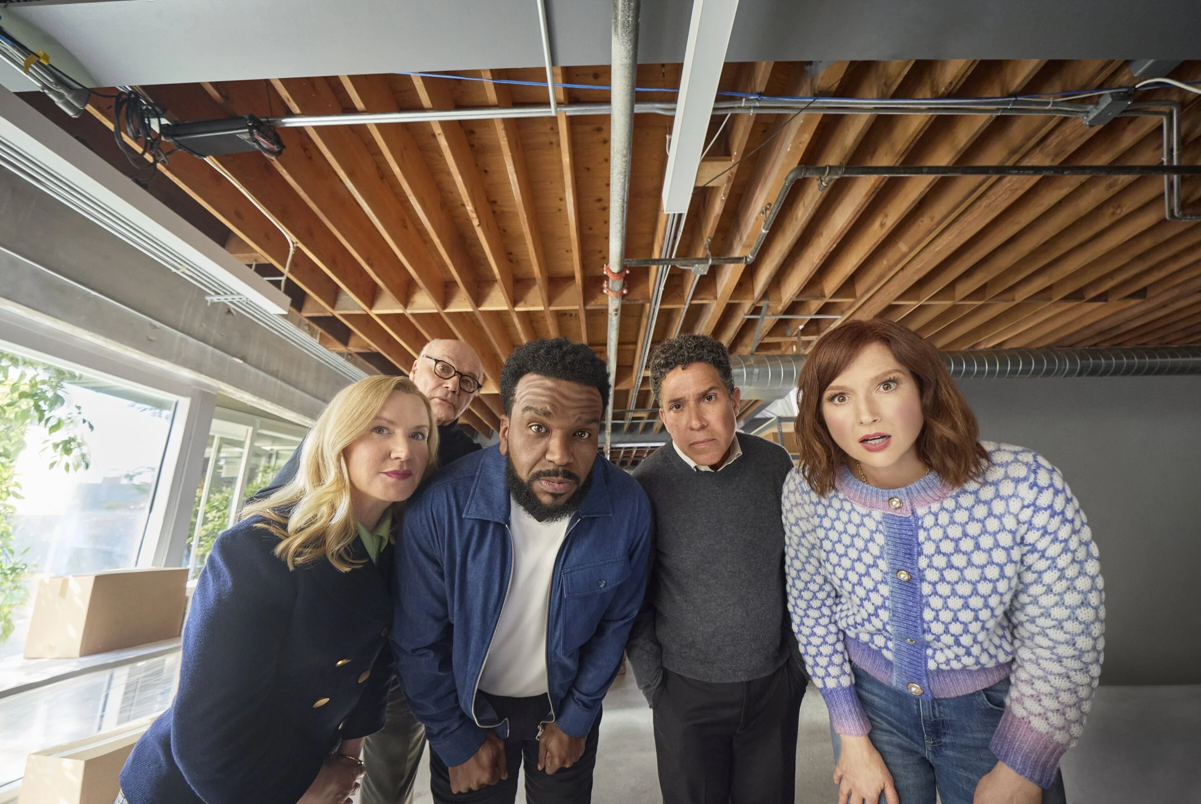 Craig Robinson, Angela Kinsey, Ellie Kemper and the CrAIg team in their office