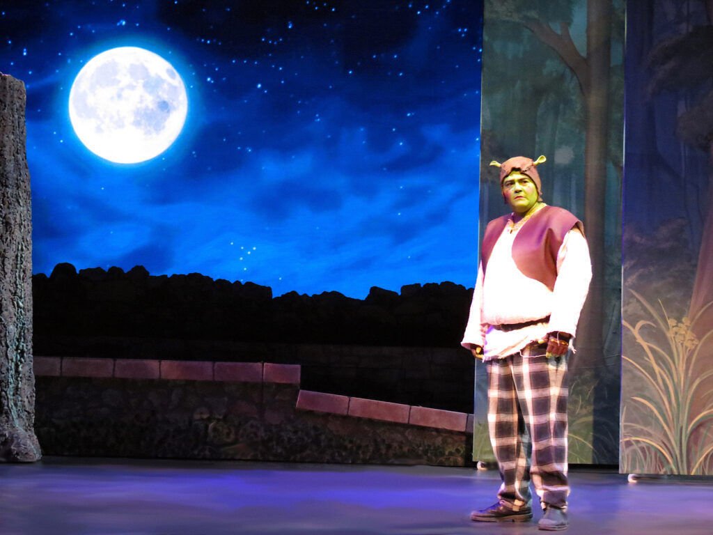 Cooper-Kaminsky-as-Shrek-with-the-moon-SHREK-Parker-Arts-and-Sasquatch-Prods.-PACE-Center-Jan.-2026-photo-Becky-Toma-1024x768.jpg