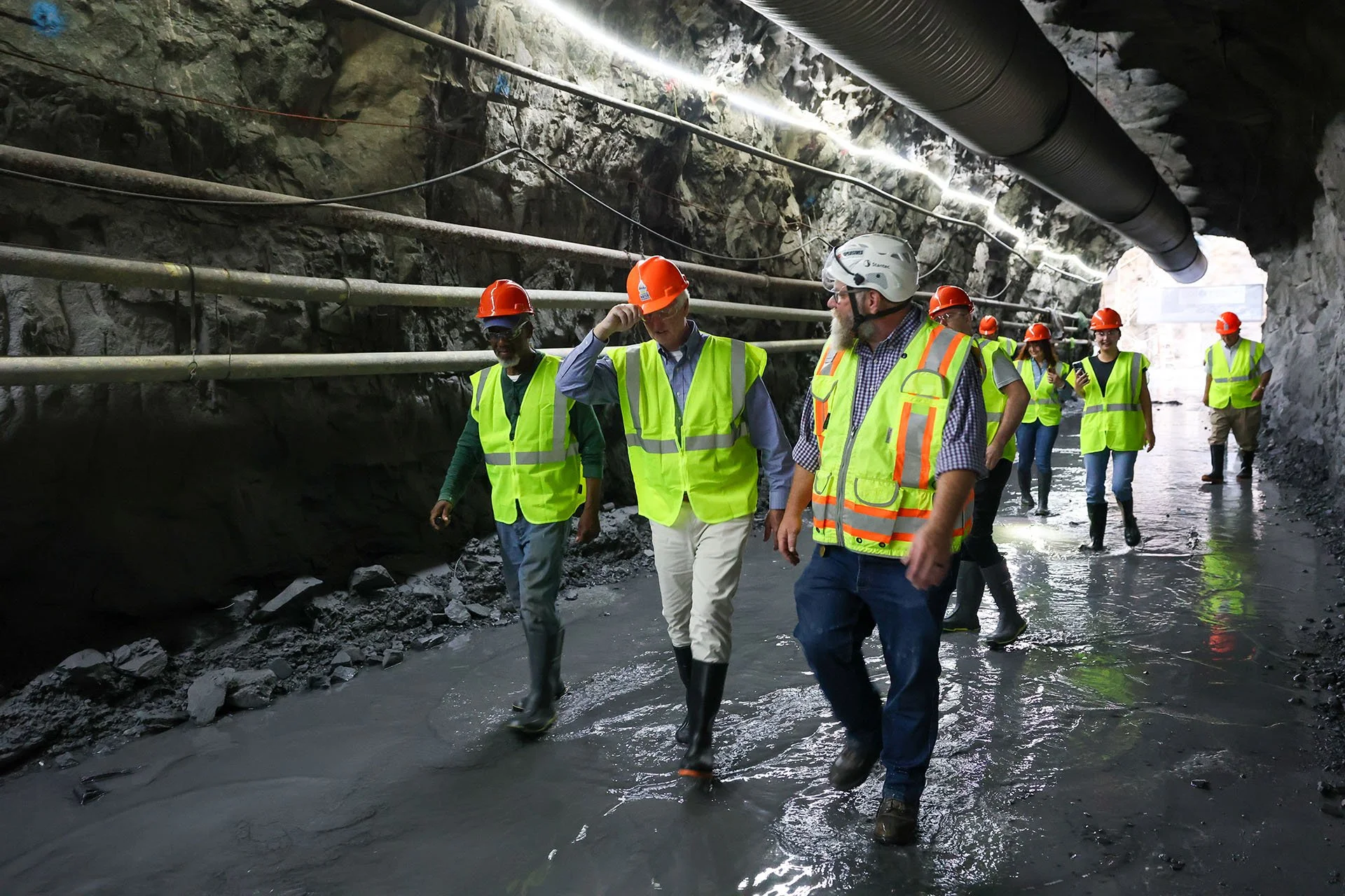 Tunnel Tour guests walk through the excavated portion of the Blackwater CSO Tunnel.