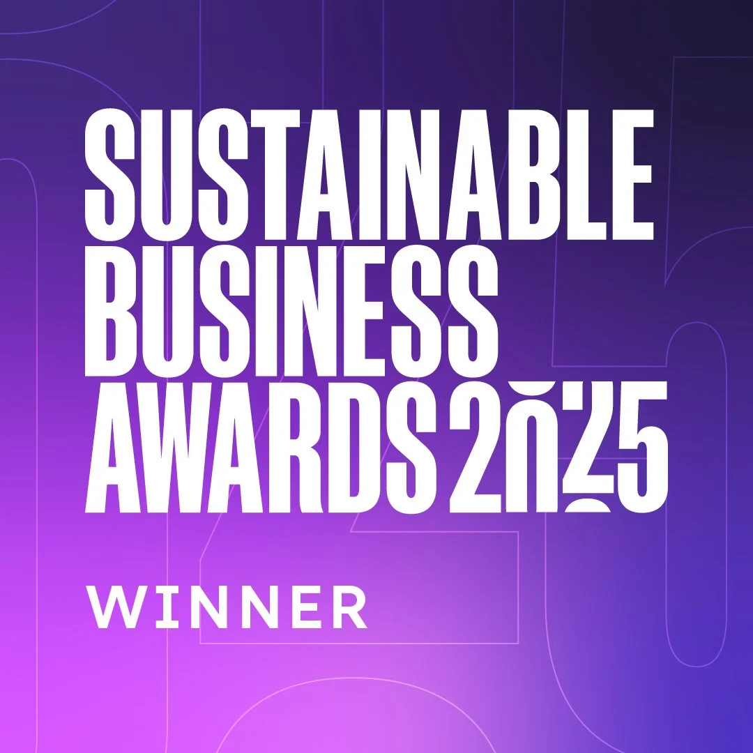 Award announcement screen with purple and blue background, large white text stating 'Sustainable Business Awards 2025 Winner'.