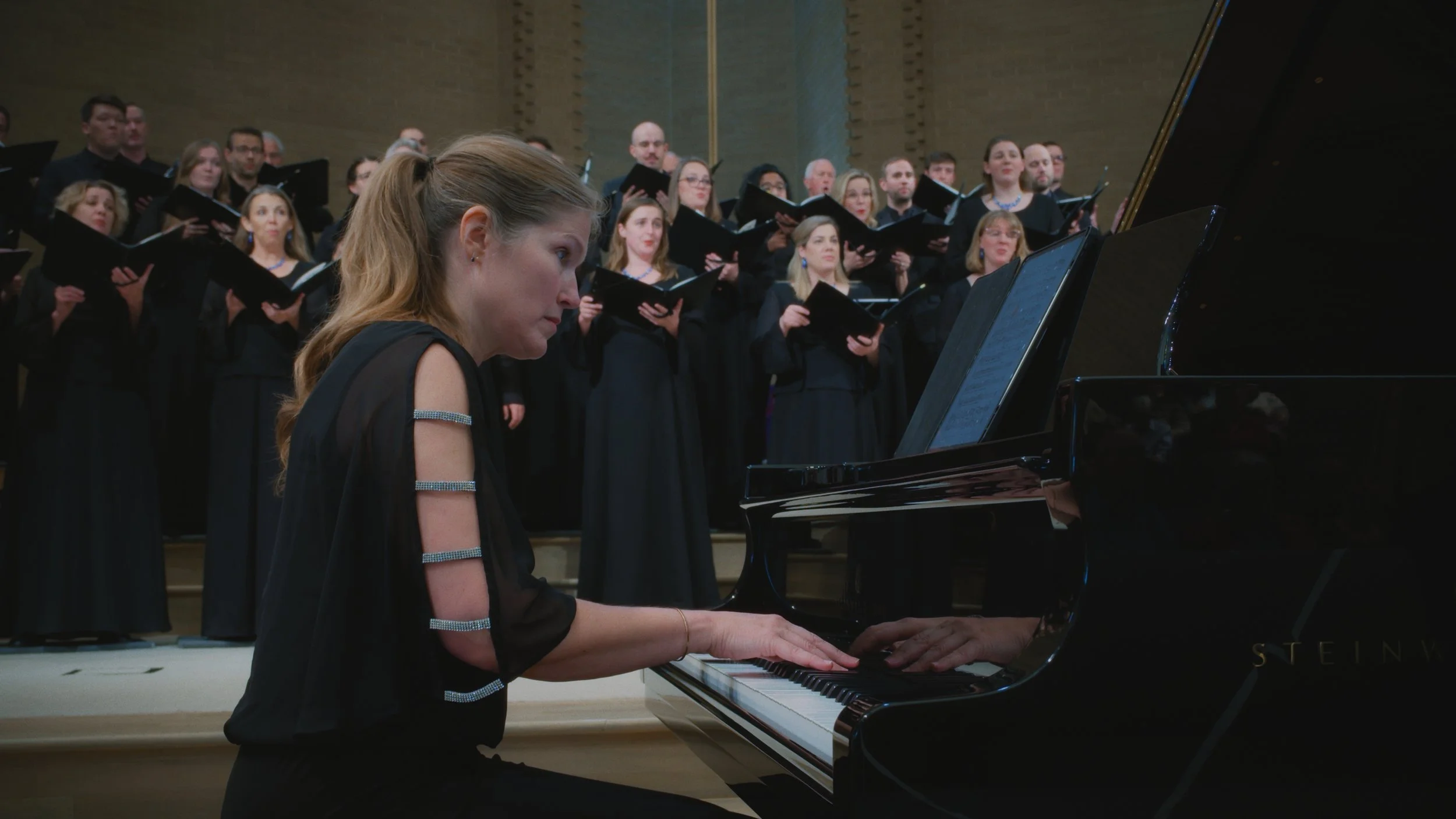 Kantorei pianist Alicia Rigsby accompanying the choir