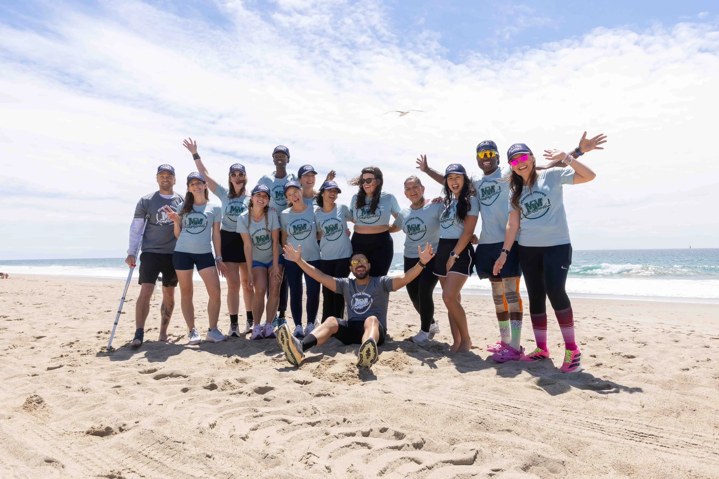 Malibu Moves ambassadors gather on Zuma Beach to celebrate movement, community, and wellness ahead of race weekend.