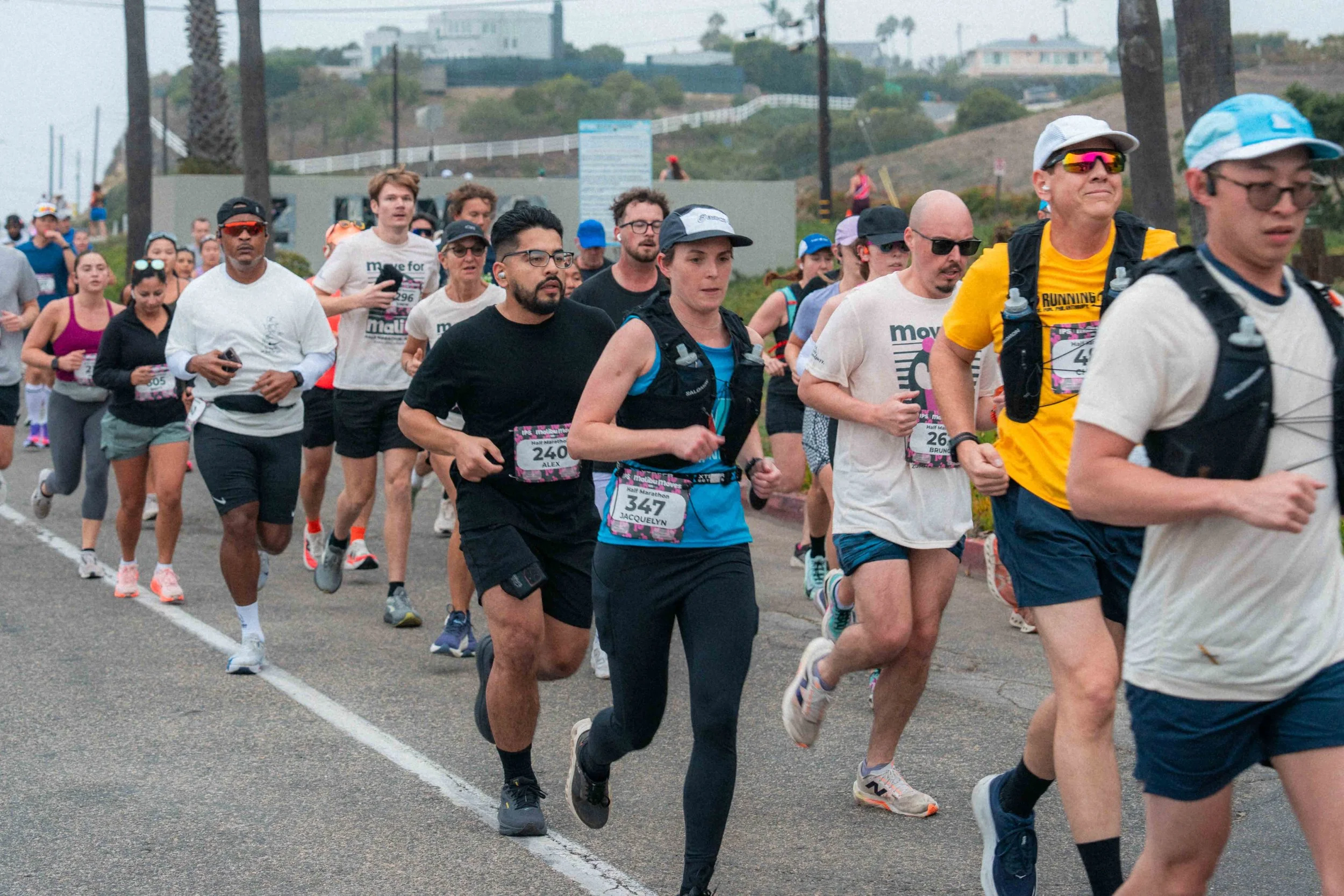 Malibiu Moves Half Marathon participants crossing the Zuma Beach gates before heading on PCH: