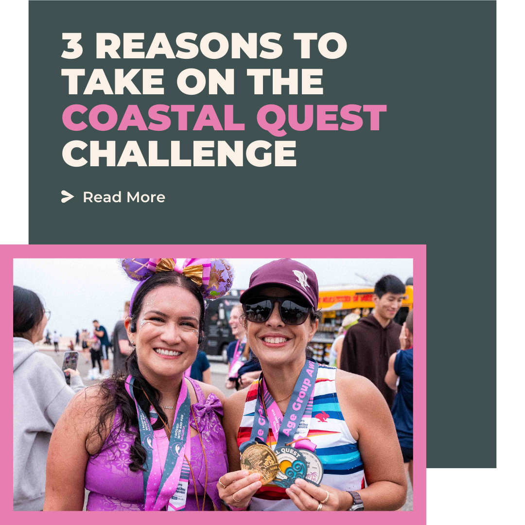 Malibu Moves Coastal Quest Challenge participants holding finisher medals at the Malibu coastline finish area.”