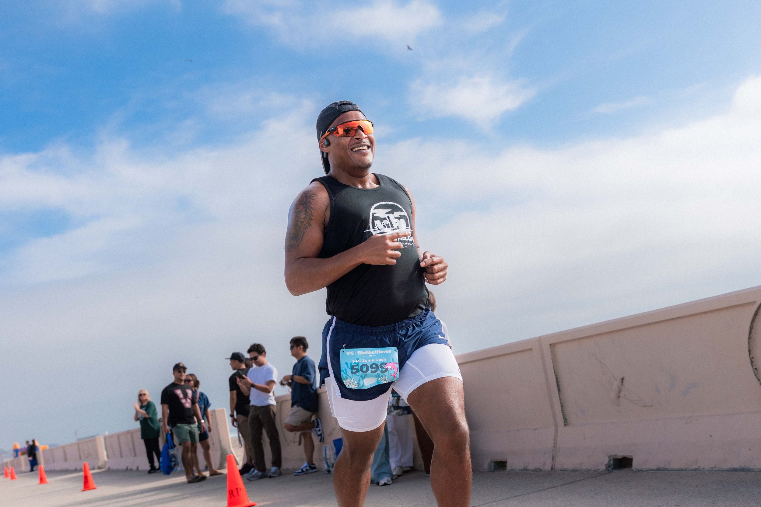 Malibu Moves participant taking part in the 1-Mile Zuma Dash at Zuma Beach in Malibu, California.