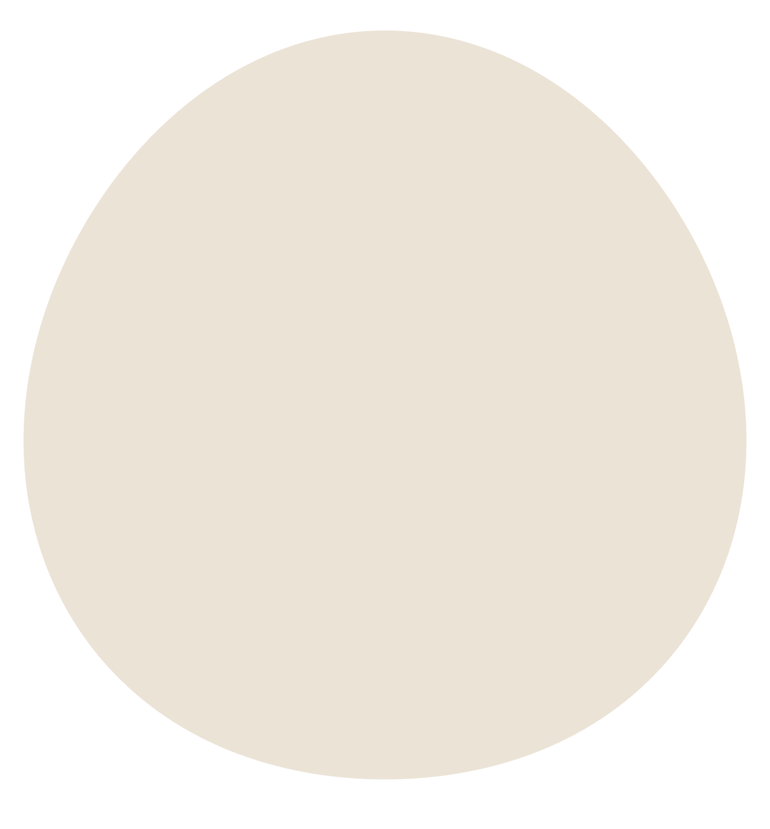 A large, plain, beige-colored circle on a black background.
