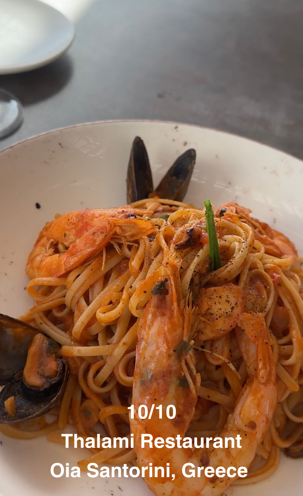 1010 Thalami Restaurant Oia Santorini, Greece.PNG