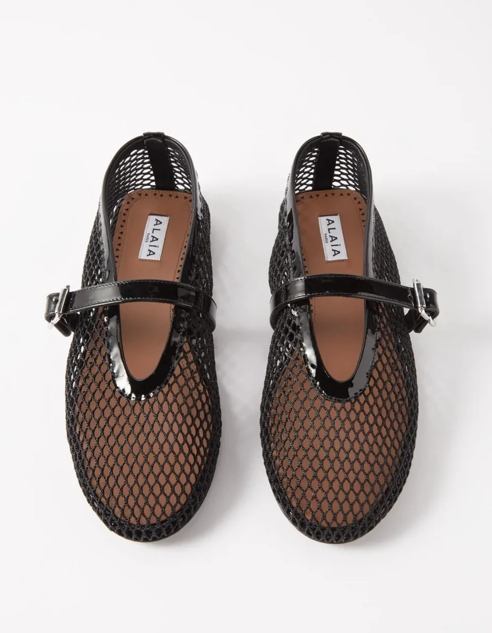 ALAIA BALLET FLATS IN FISHNET $710 USD