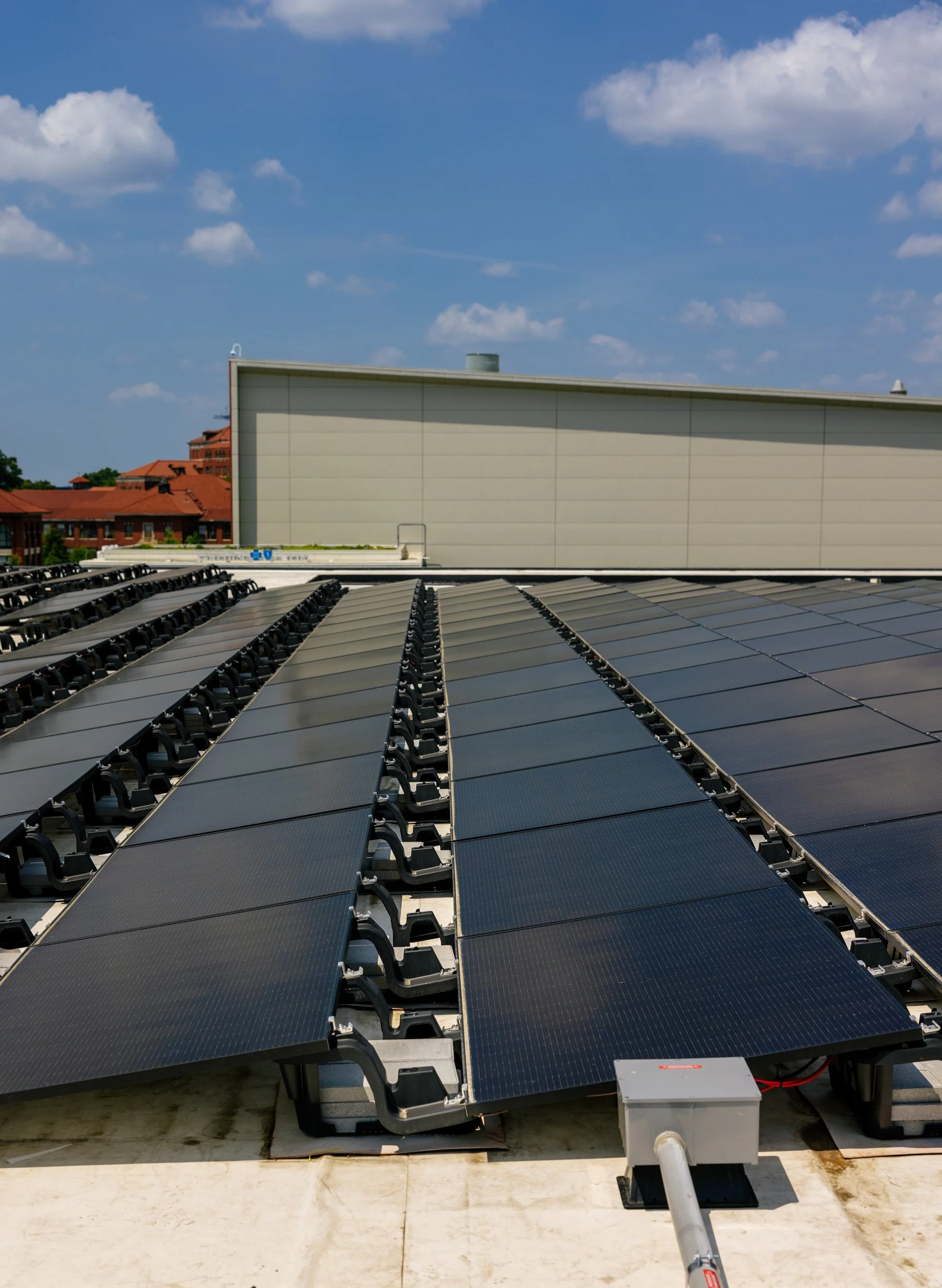 A completed solar panel array installed by GRID Alternatives trainees on a rooftop in Los Angeles, California.
