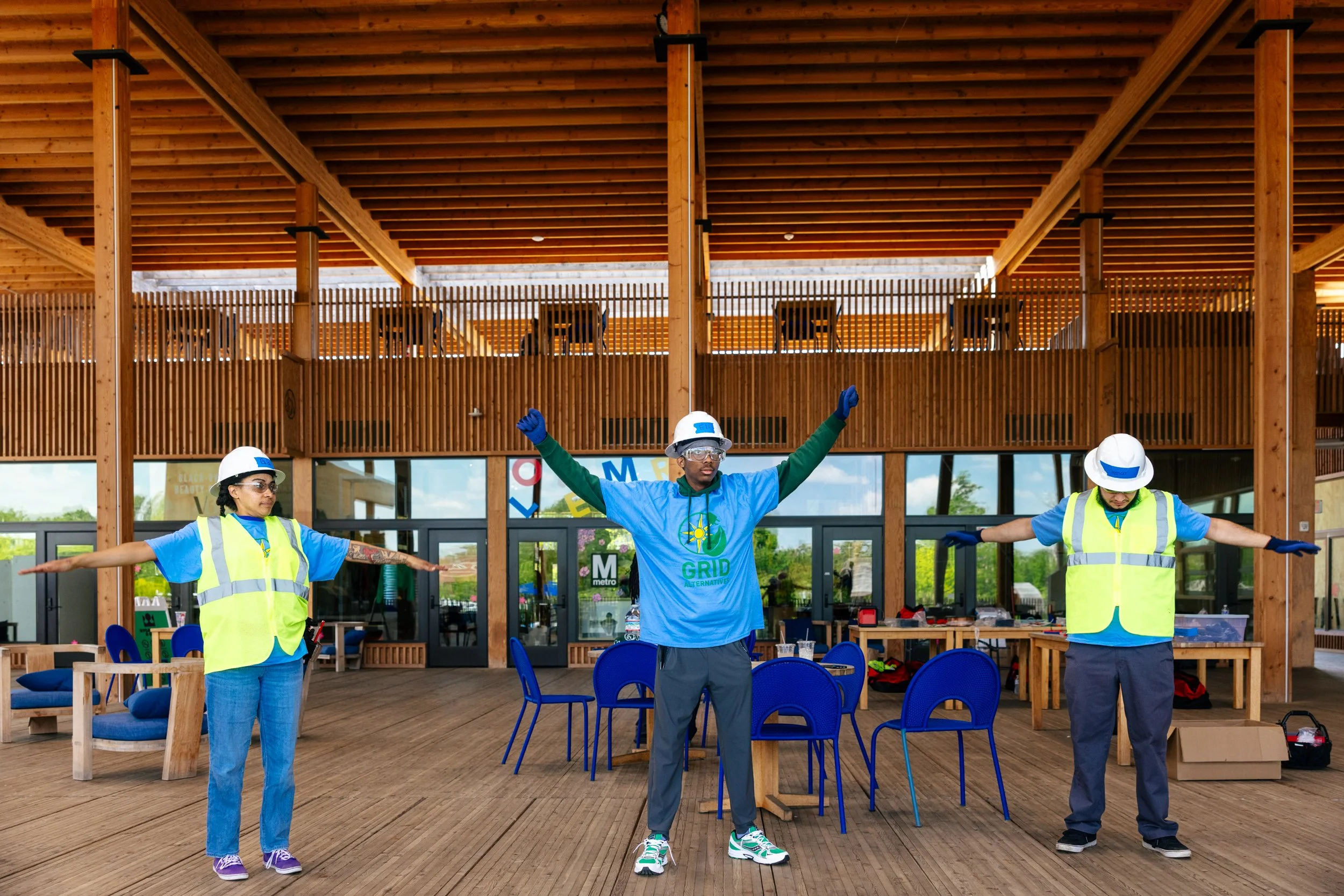 GRID Alternatives IBT 120 trainees warm up before a hands-on solar installation training session at the Sycamore and Oak facility in Washington, D.C.